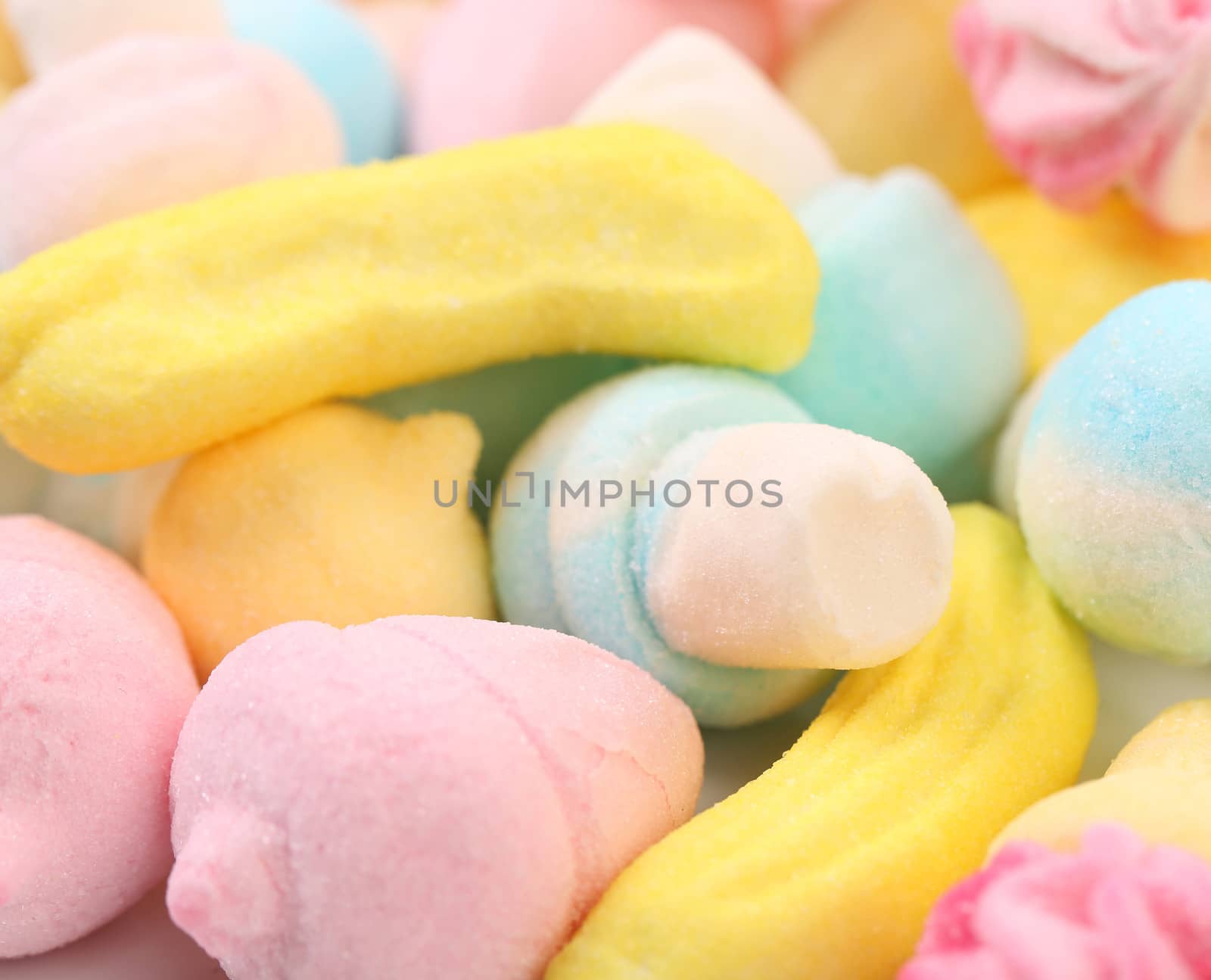 Different colorful marshmallow. Close up. Whole background.