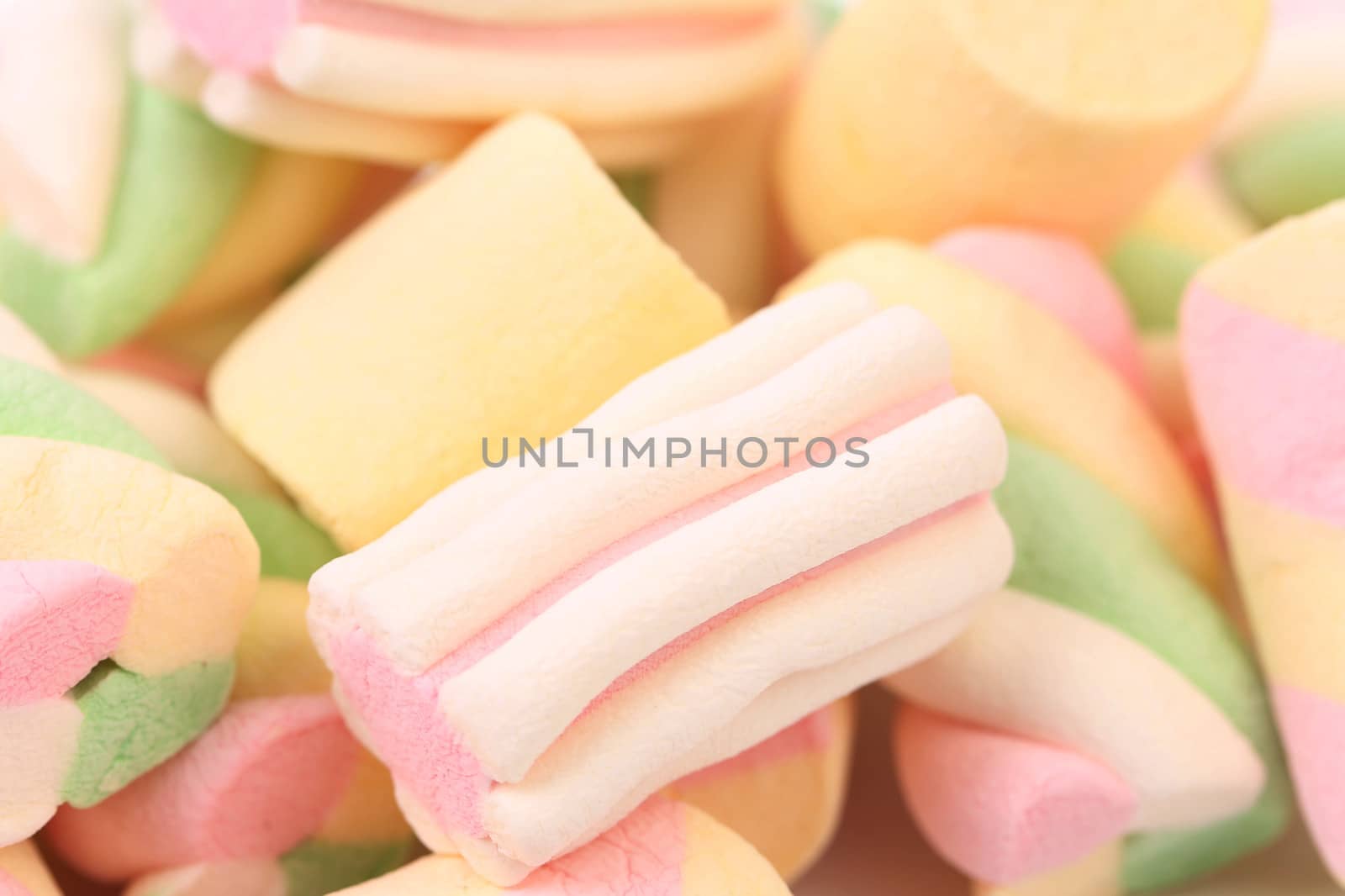 Different colorful marshmallow. Close up. Whole background.