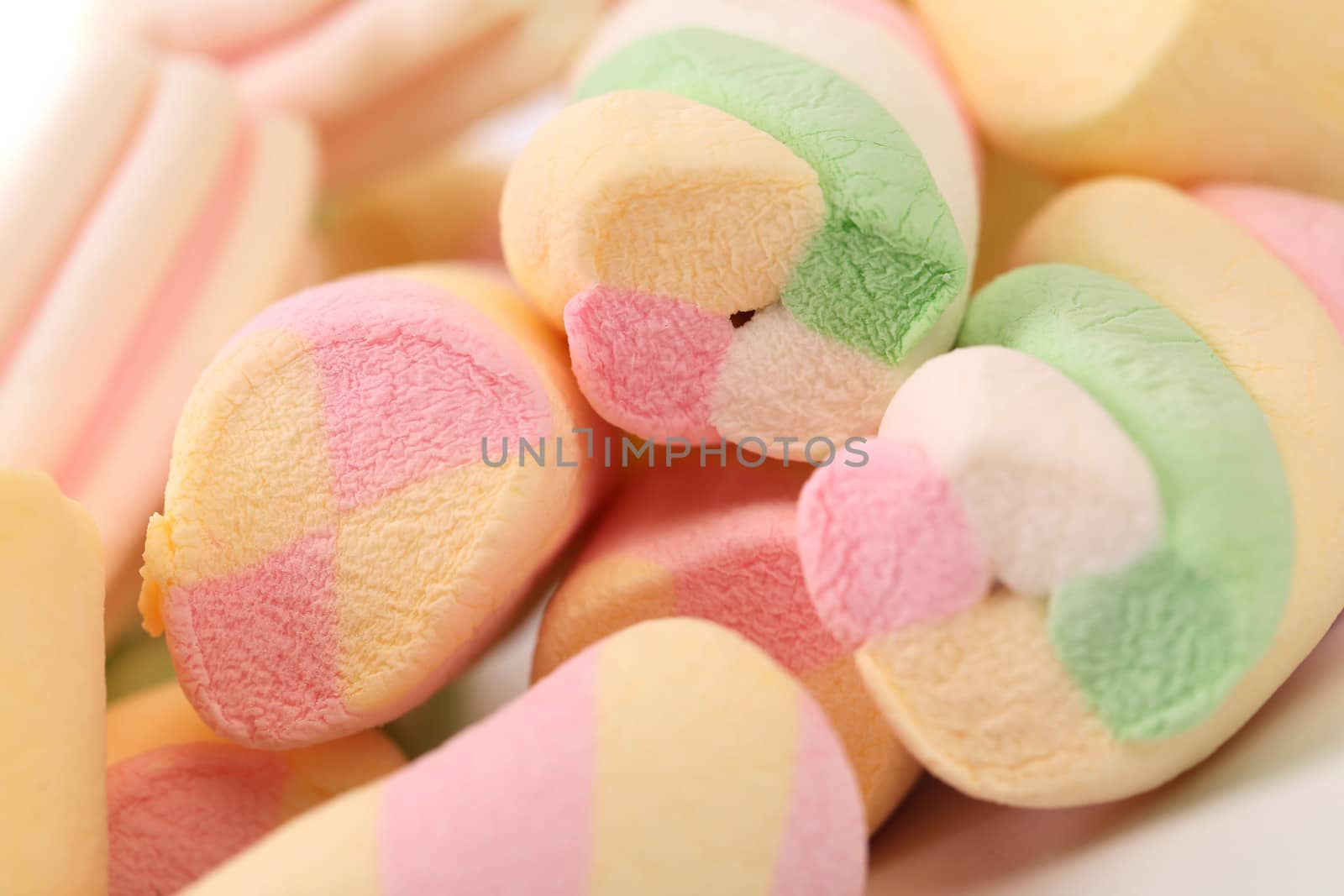 Different colorful marshmallow. Close up. Whole background.