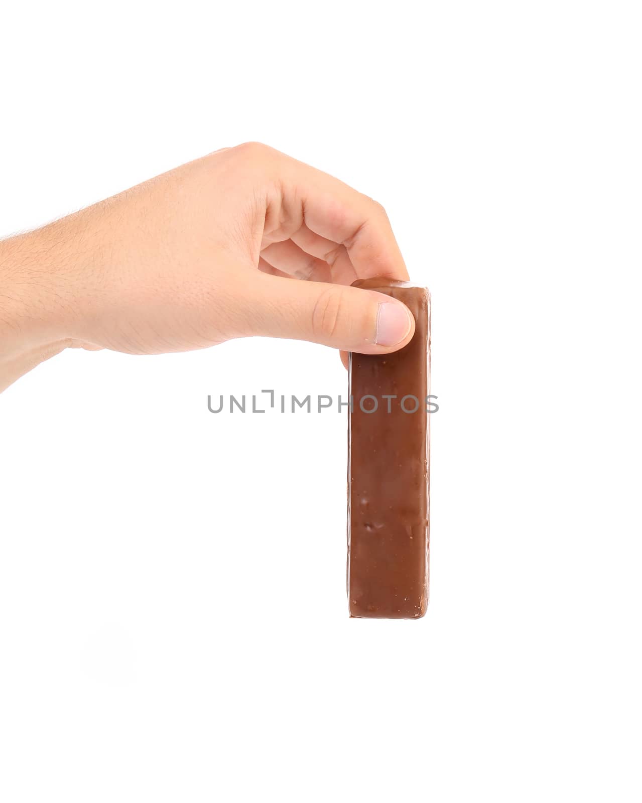 Hand hold chocolate bar. Isolated on a white background.