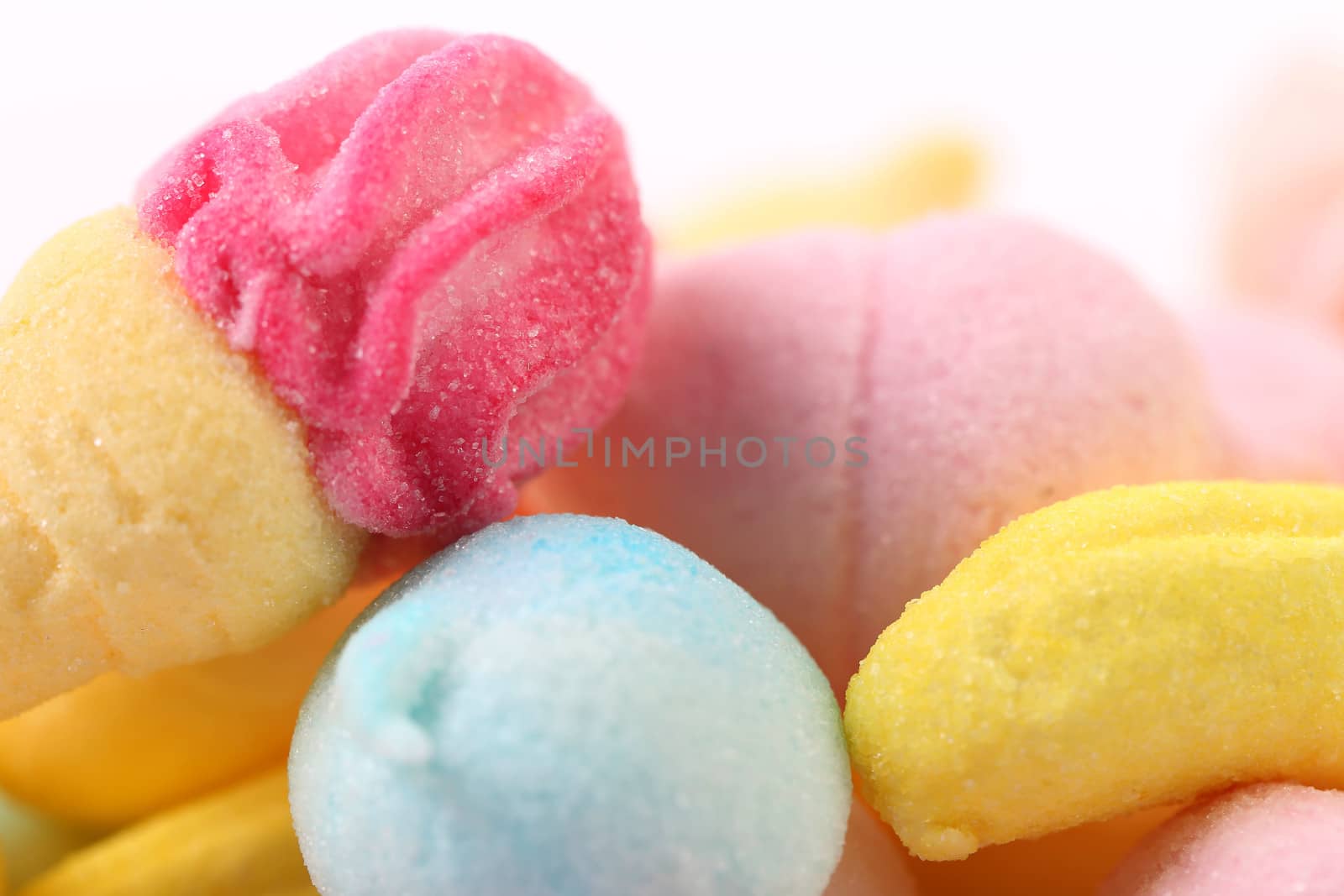 Different colorful marshmallow. Close up. Whole background.