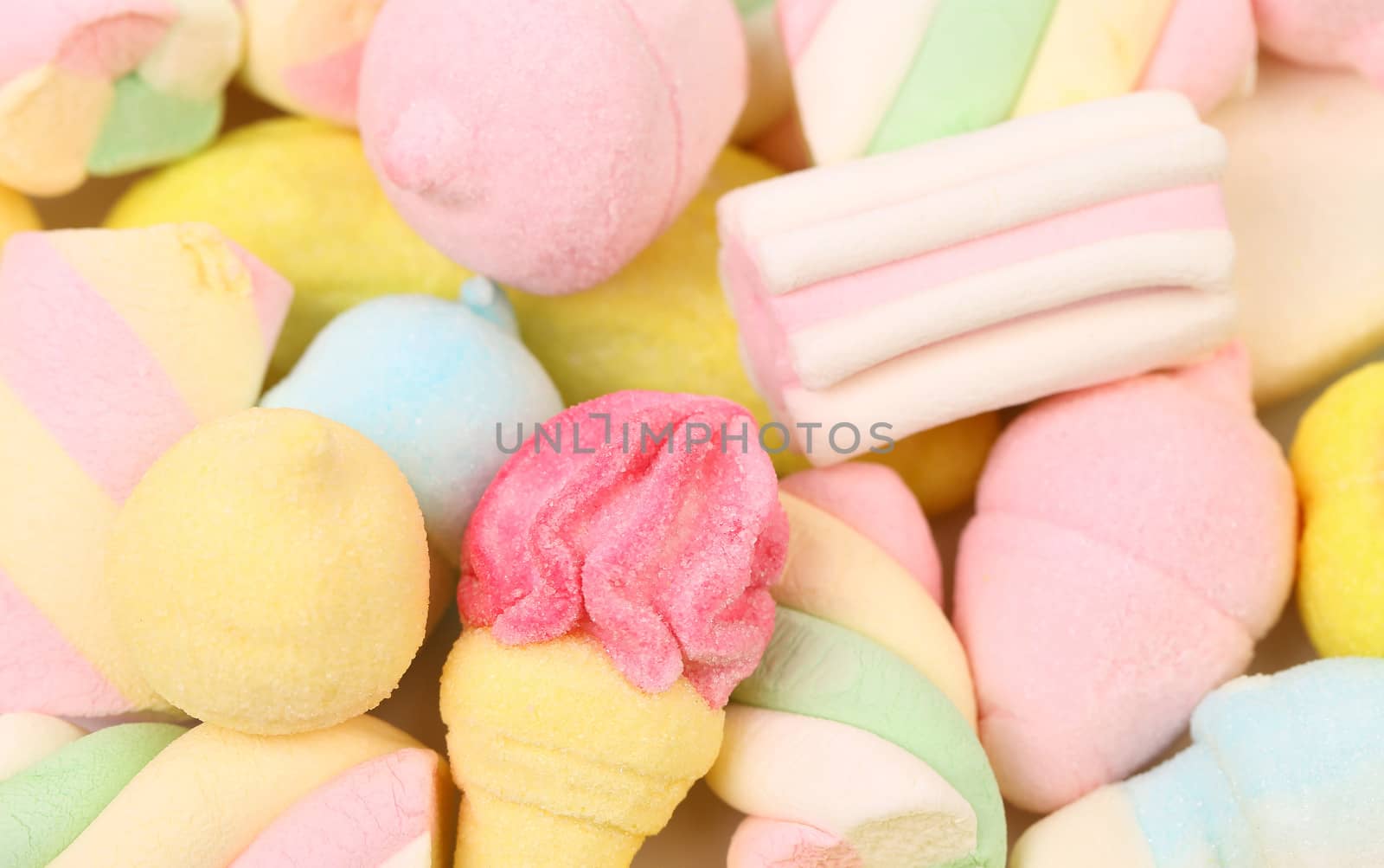 Different colorful marshmallow. Close up. Whole background.