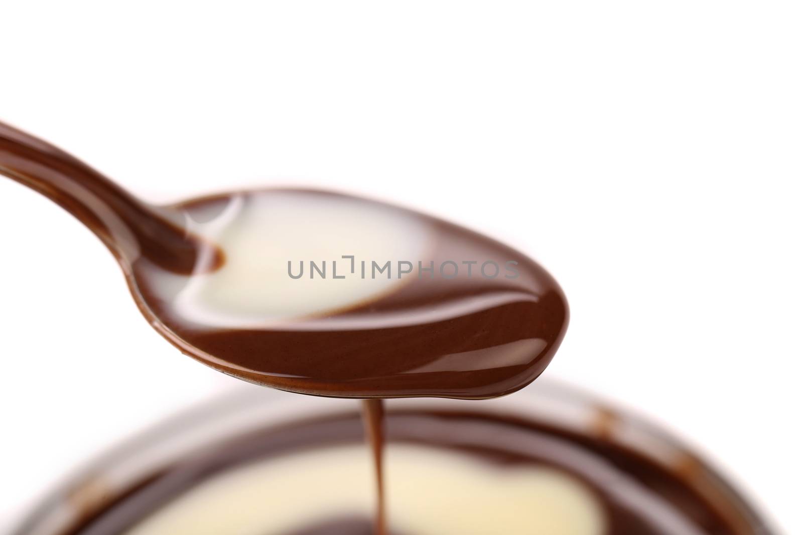 Lots of different chocolate falling from above. Close up.