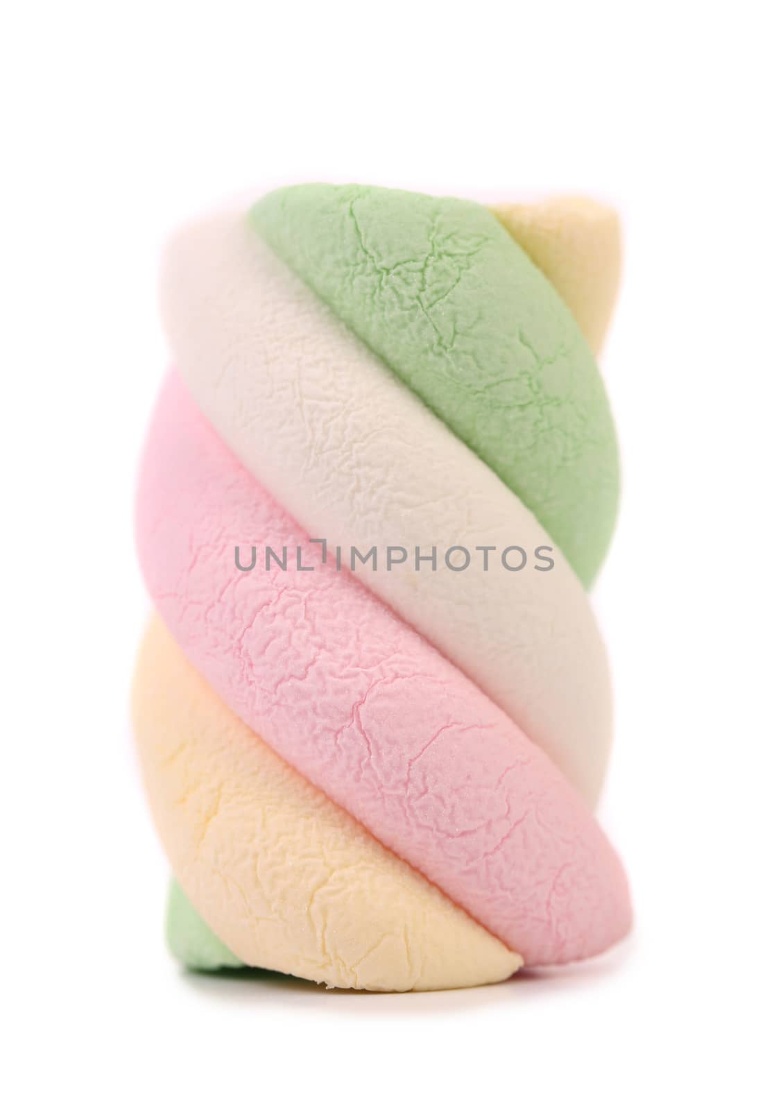 One colourful marshmallow. Close up. White background.