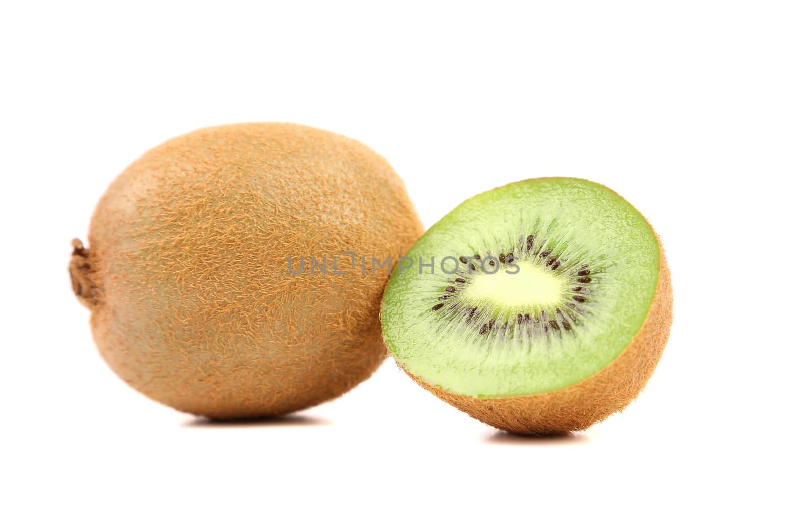 Green kiwi and slice isolated on a white background