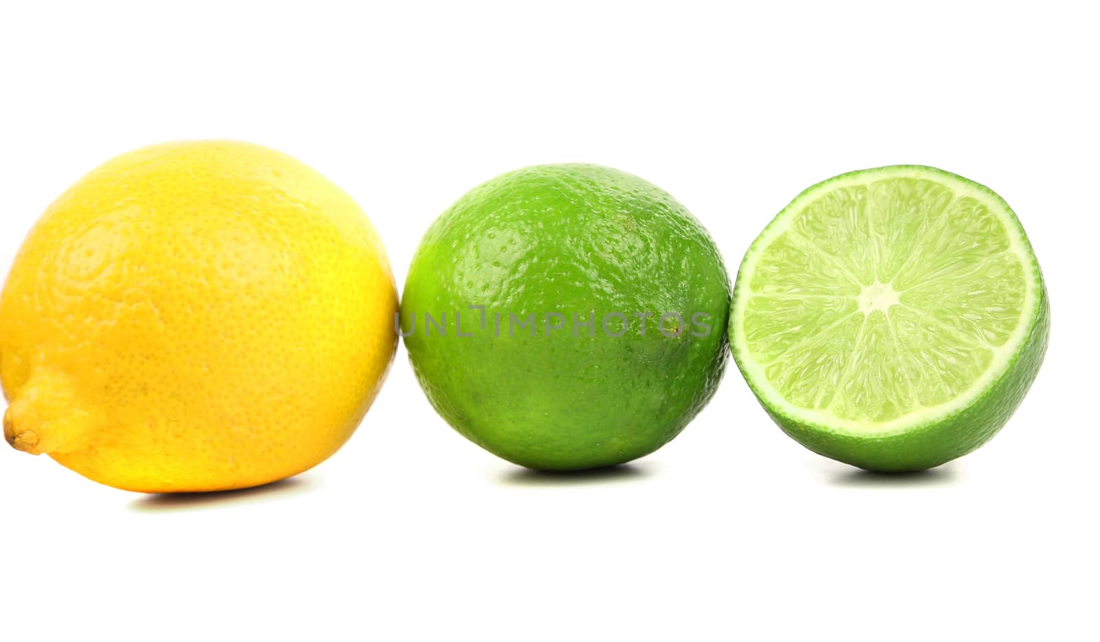Lemon, lime and slice. Close up. White background.