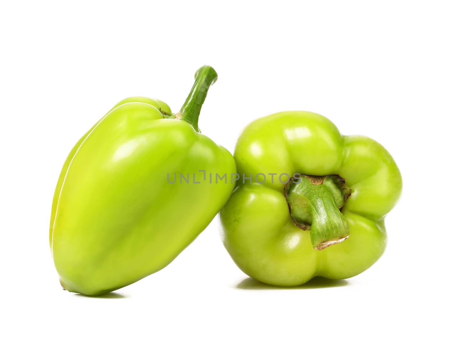 Green peppers isolated on a white background.