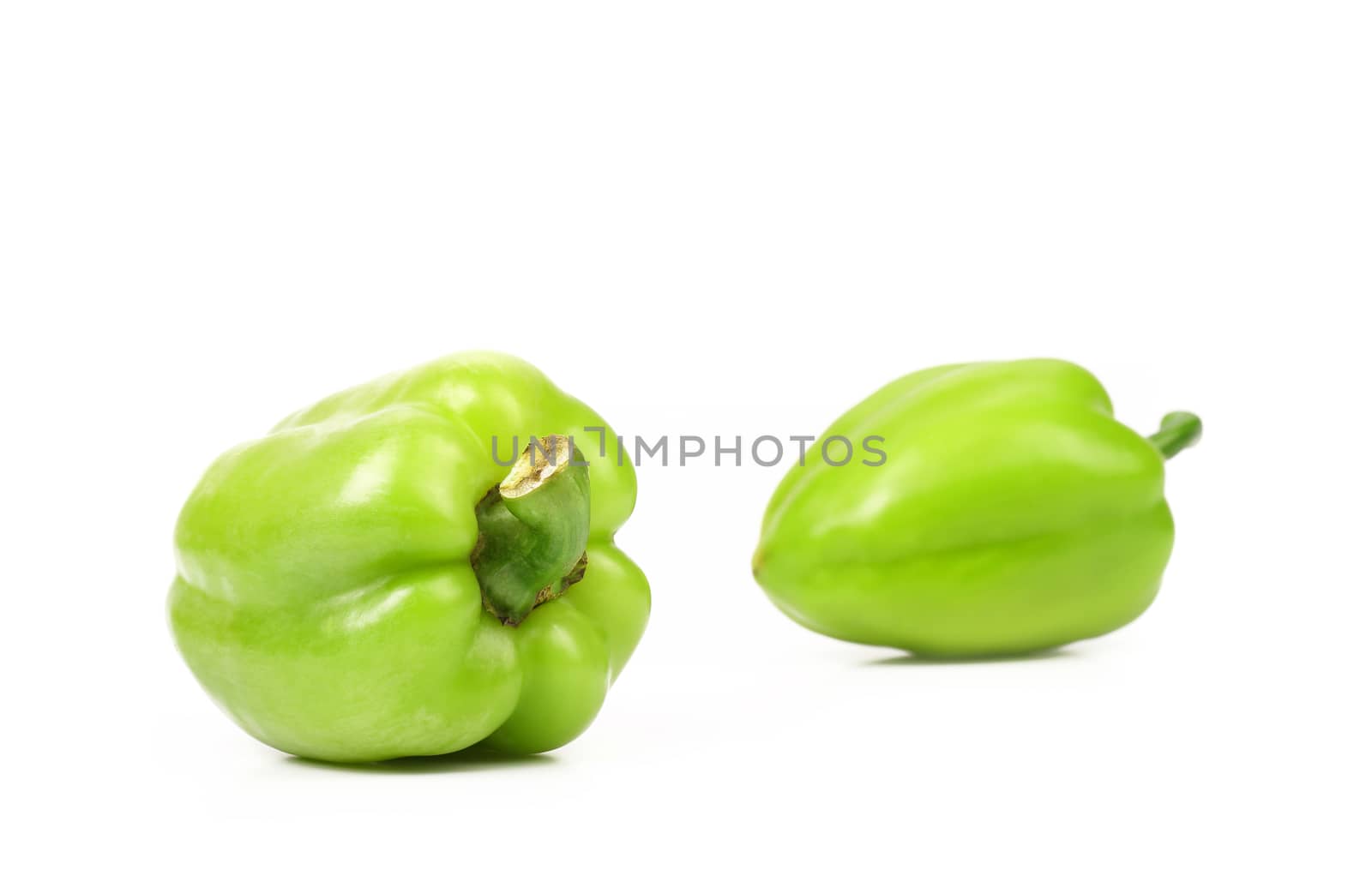Yellow peppers isolated on a white background.