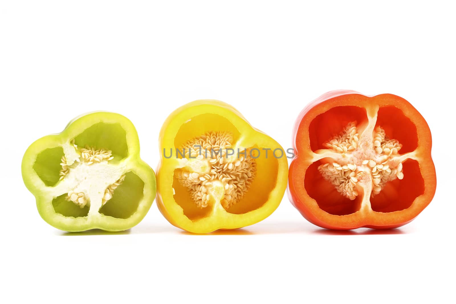 Three half of bell pepper on white background