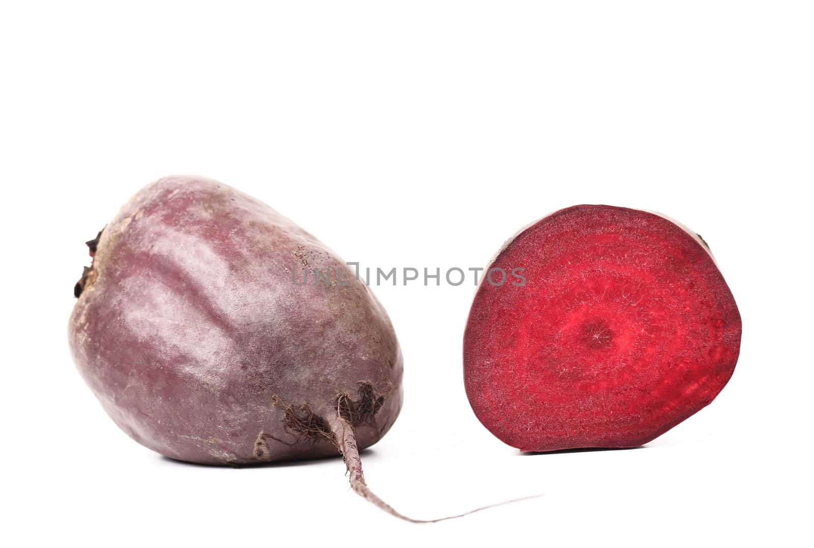 Fresh beetroot and slice isolated on a white background.