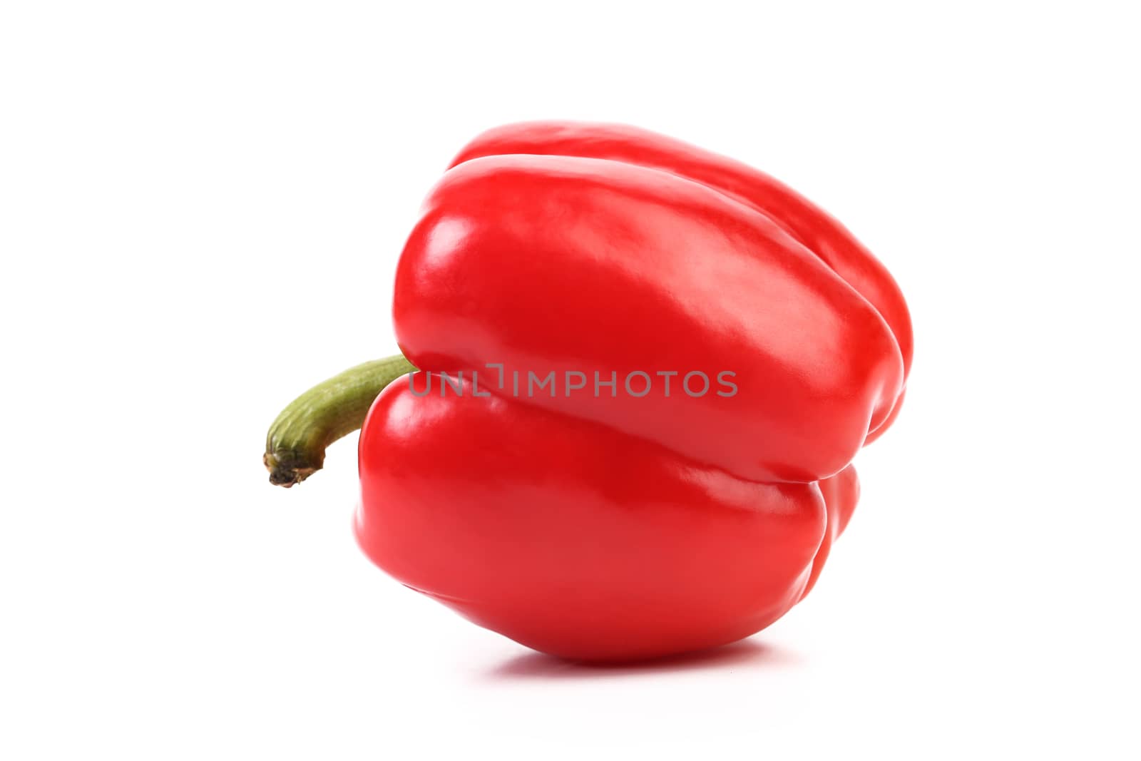 Red pepper with tail on a white background.