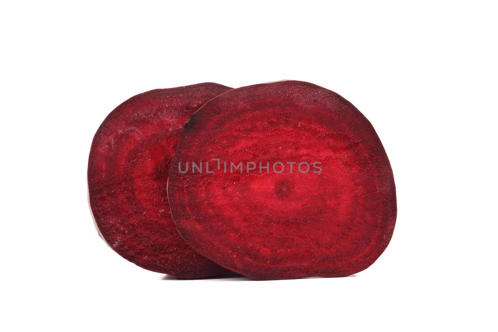 Two beetroot slices isolated on a white background.