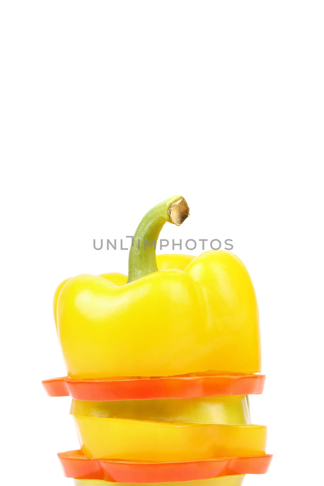 Stack of slices pepper. Isolated on a white background