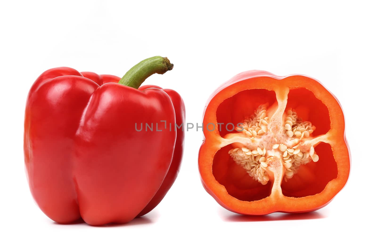 Sweet pepper and slice isolated on a white background