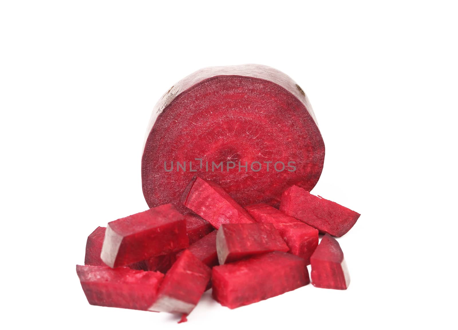 Fresh segments of a beet on a white background