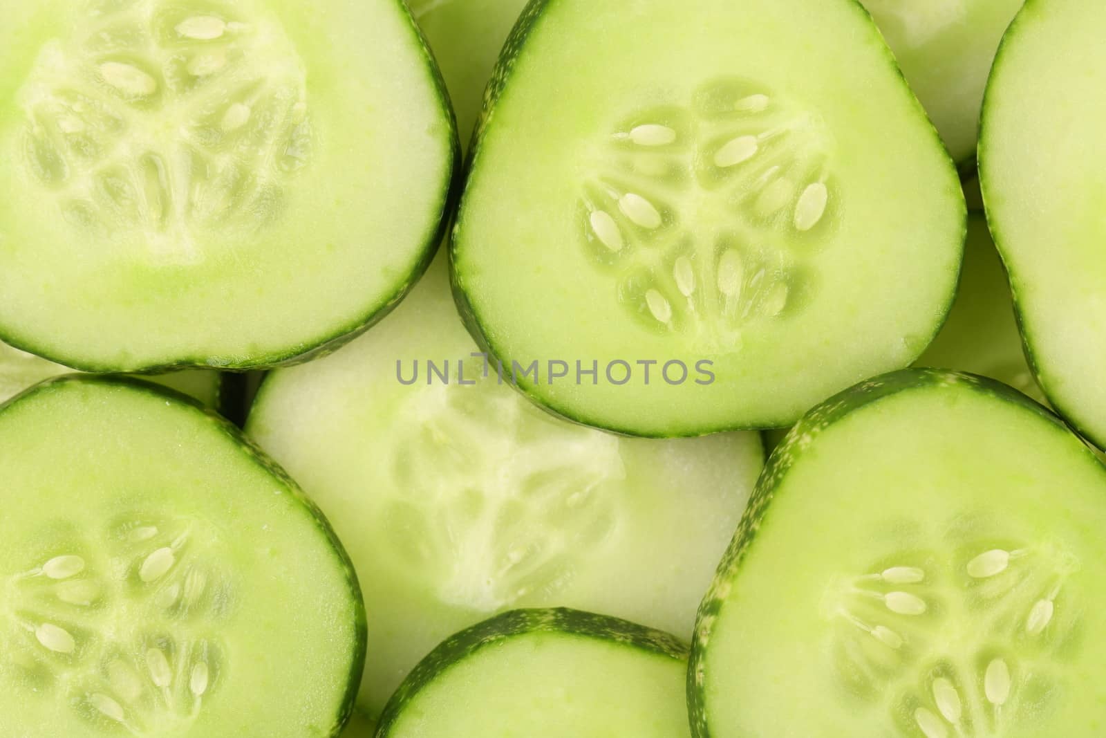 Background of slices cucumber. Macro. Whole background.