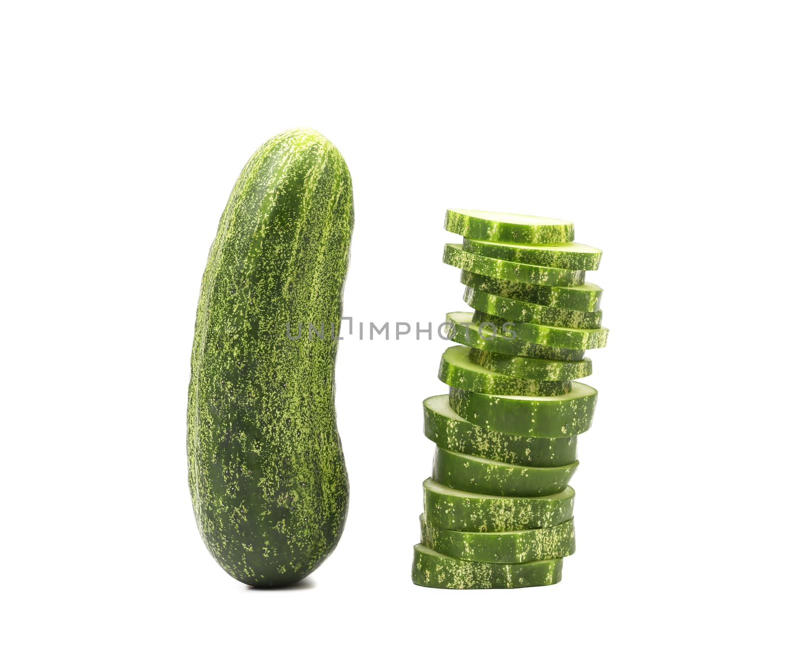Cucumber and stack of slices. White background.