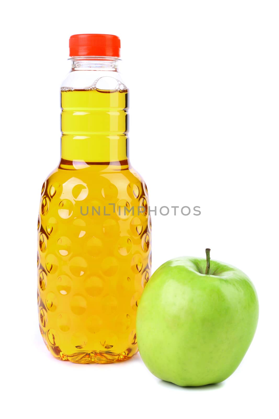 Delicious apple juice in plastic bottle. White background.