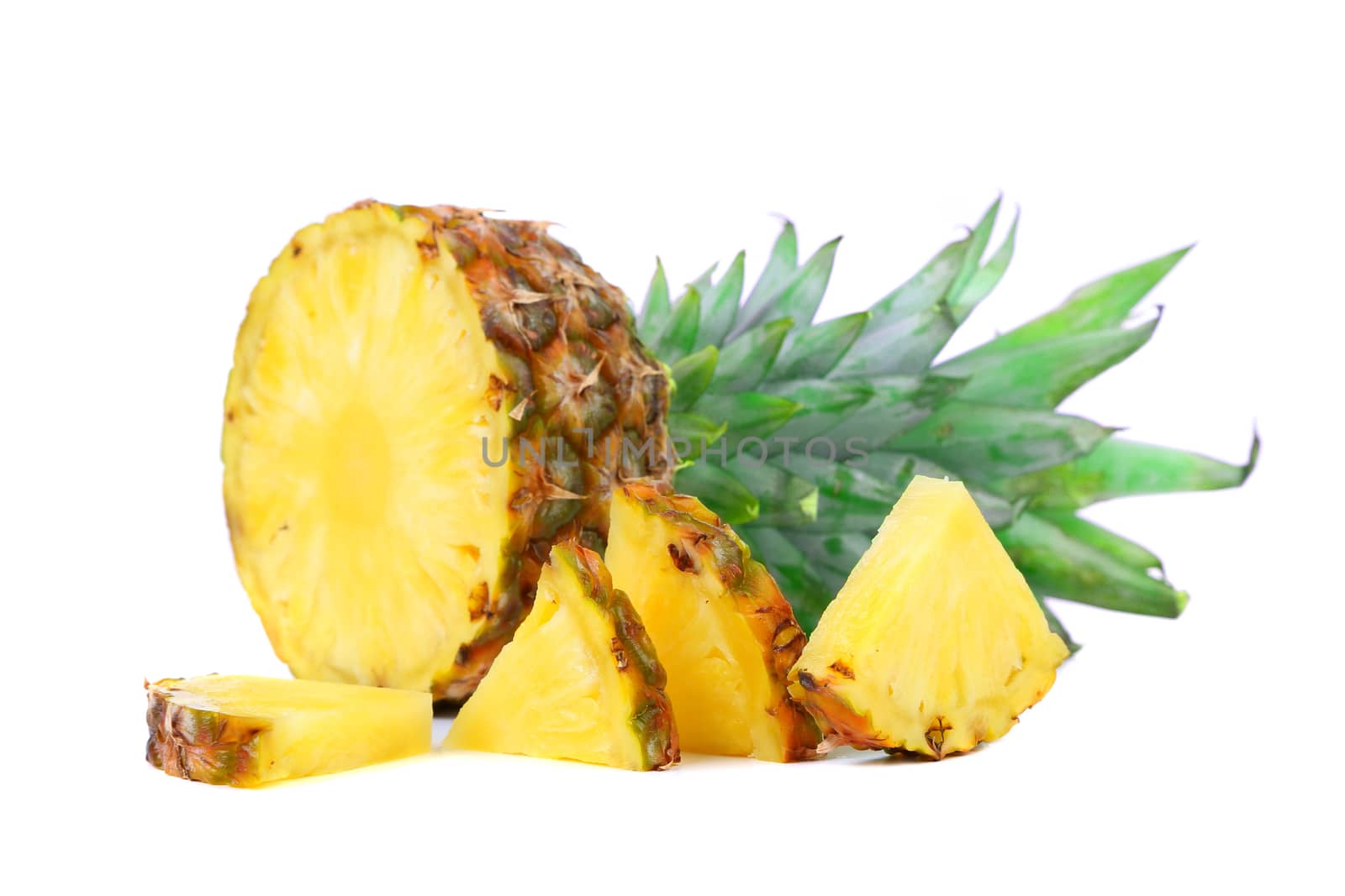 pineapple with slices isolated on a white background