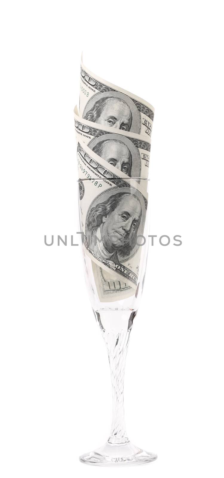 Wine glass with money isolated on white with clipping path