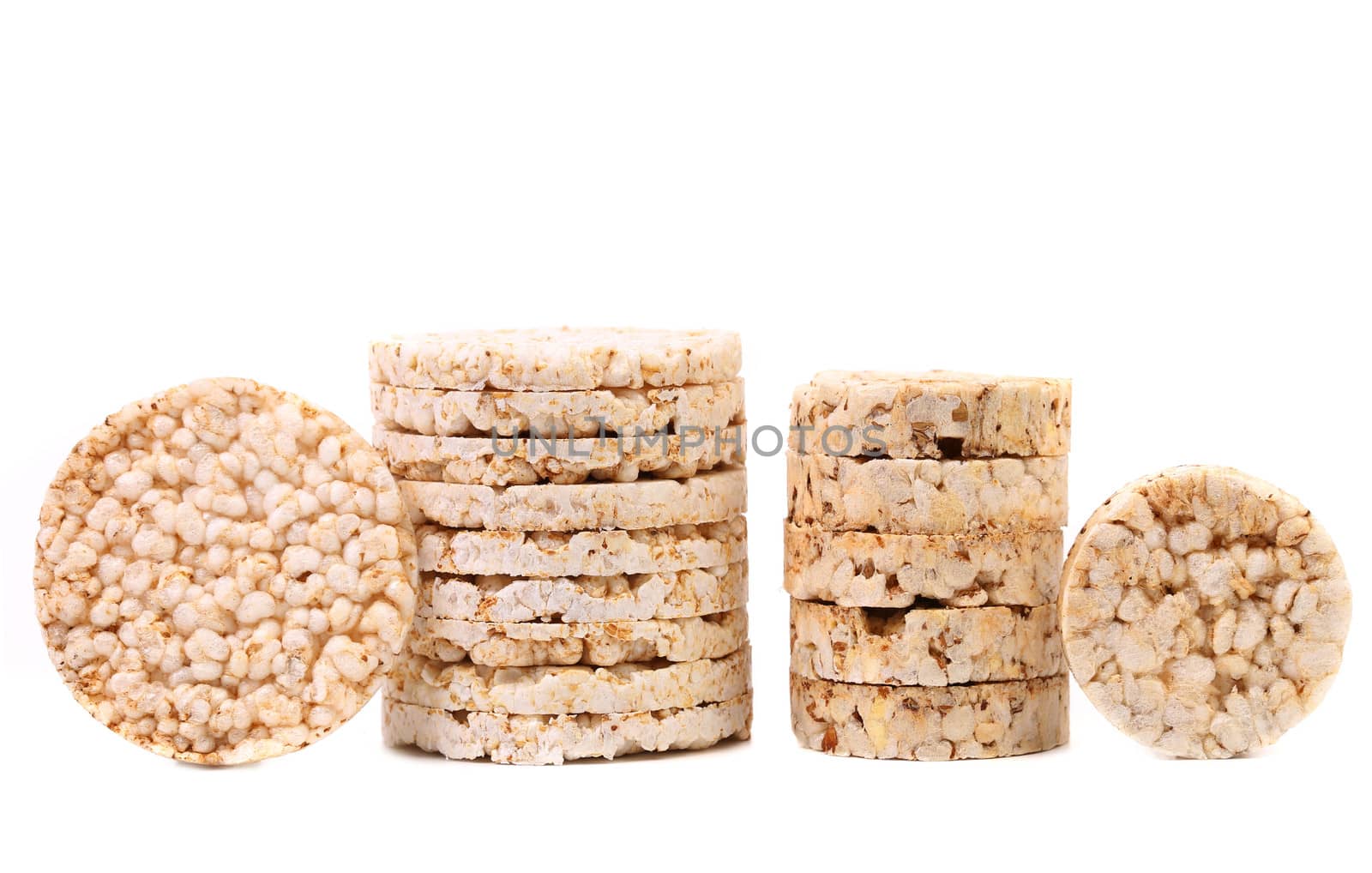 Stacks of rice cakes. Close up. White background.