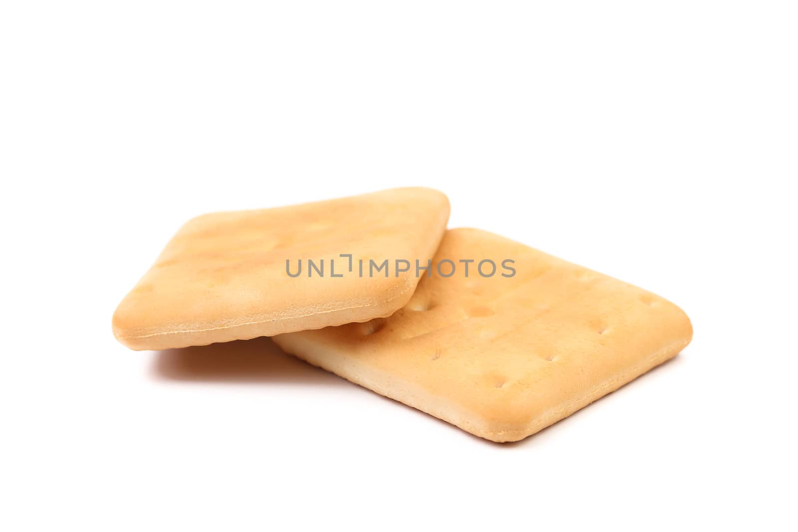 Saltine soda cracker isolated on white background