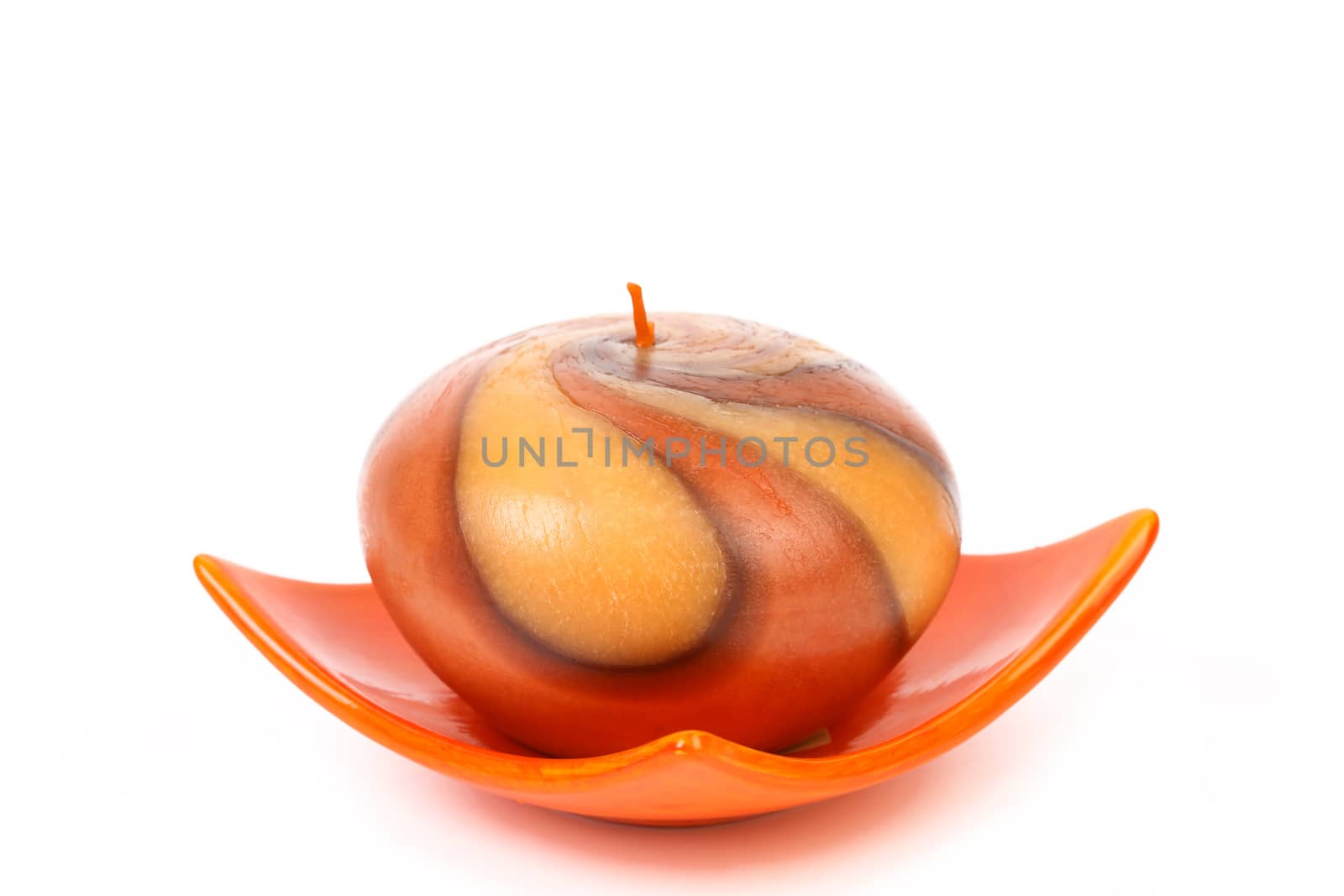 Decorative colourful candle. Isolated on a white background.