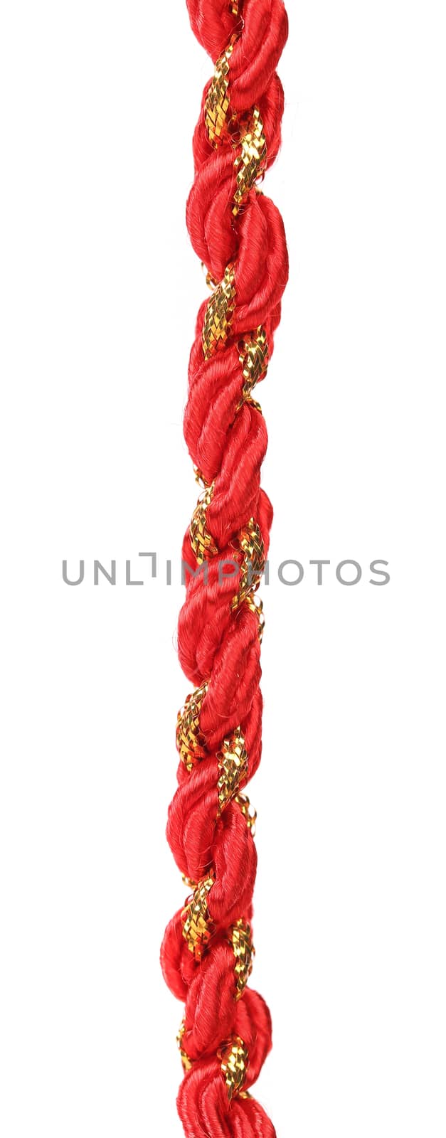 Red and gold gift wrapping cord. White background.