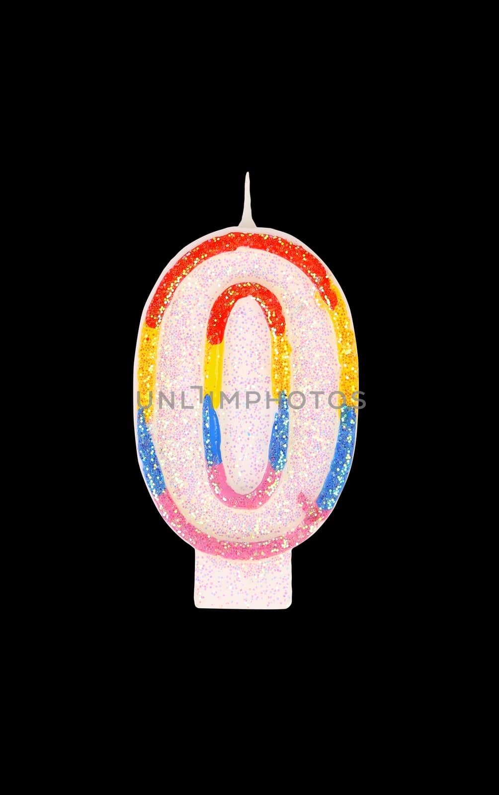 Candle in the form of nil figures. Black background.