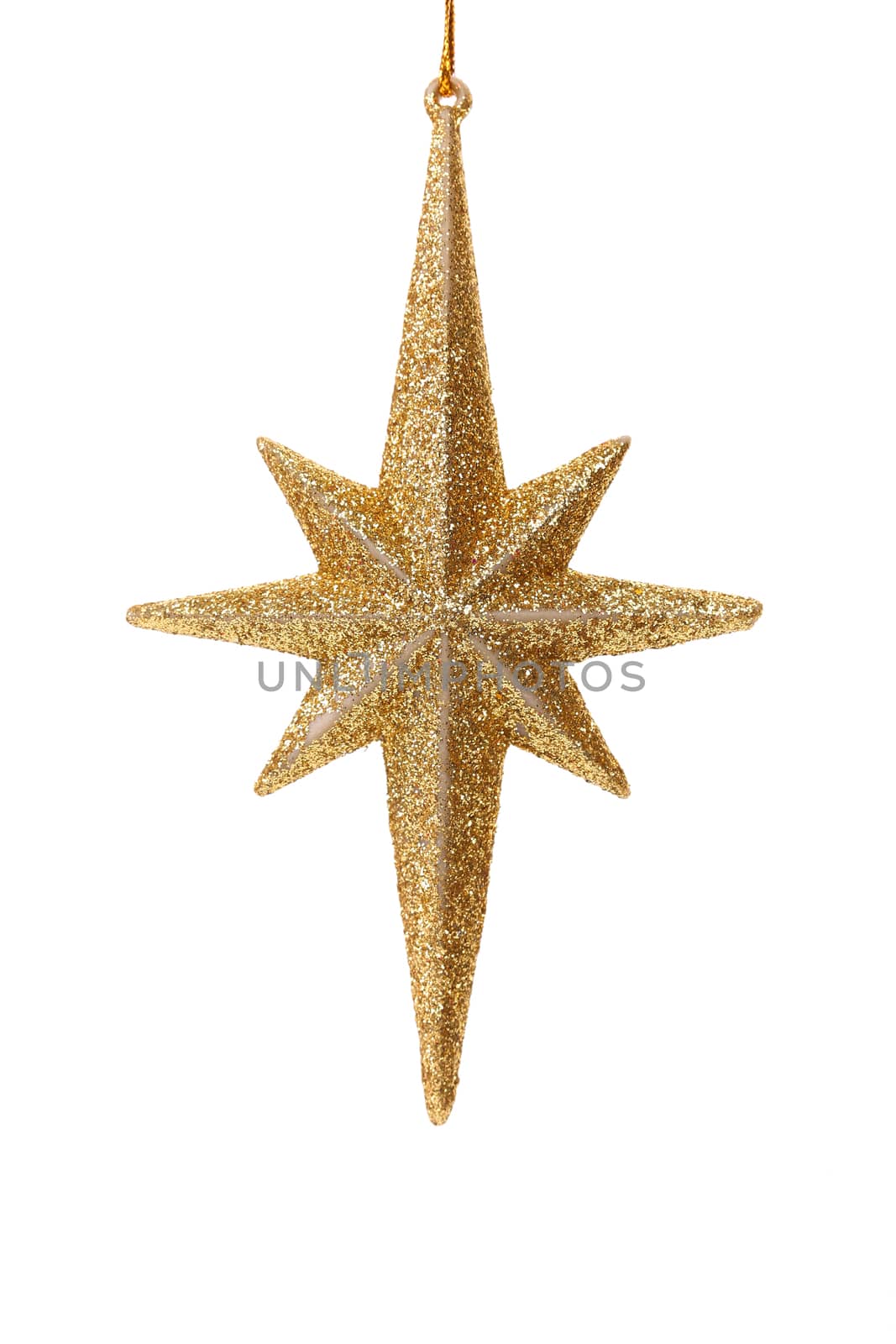 Close up of golden glitter star isolated on white background.