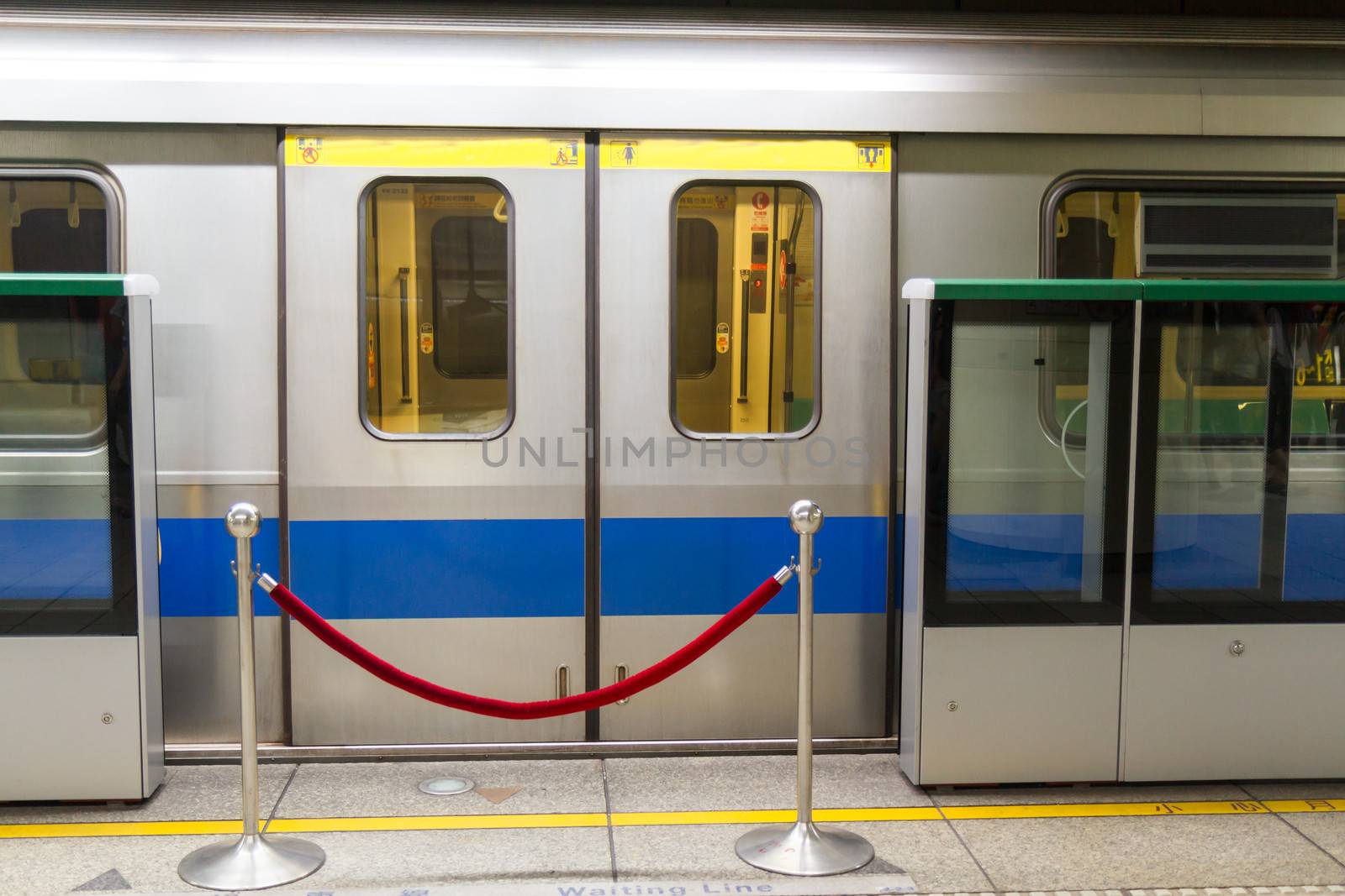 MRT with red rope barrier in front of the closed doors