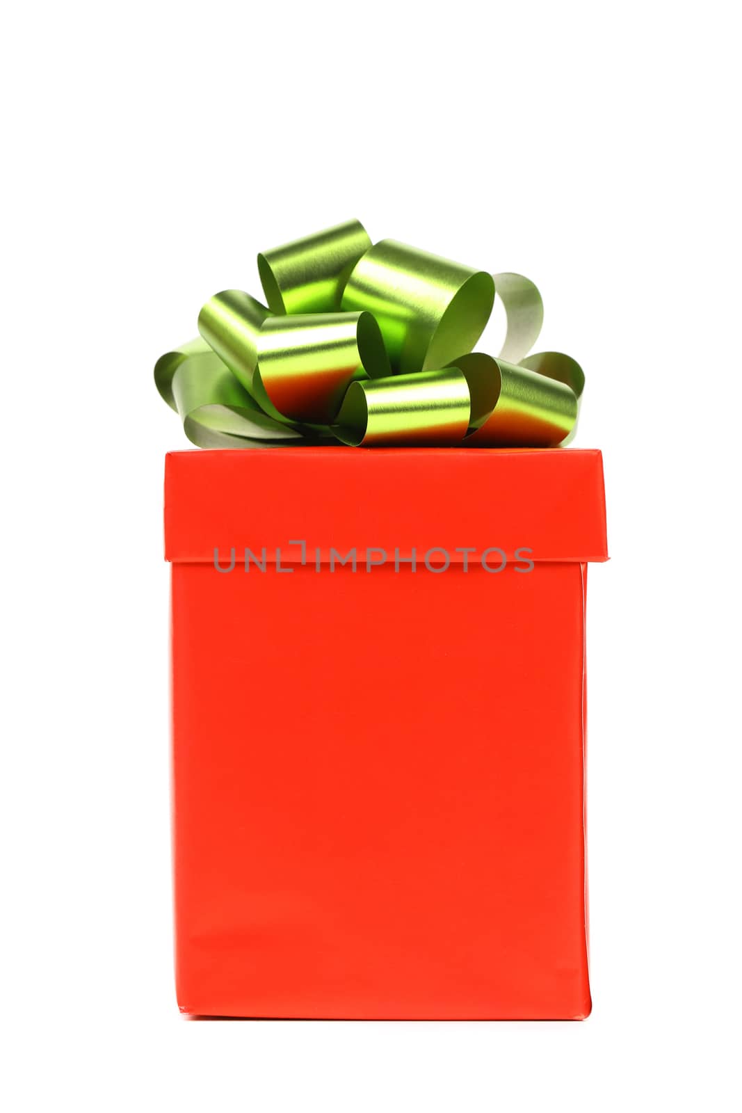 Red gift box with green-golden bow. White background.