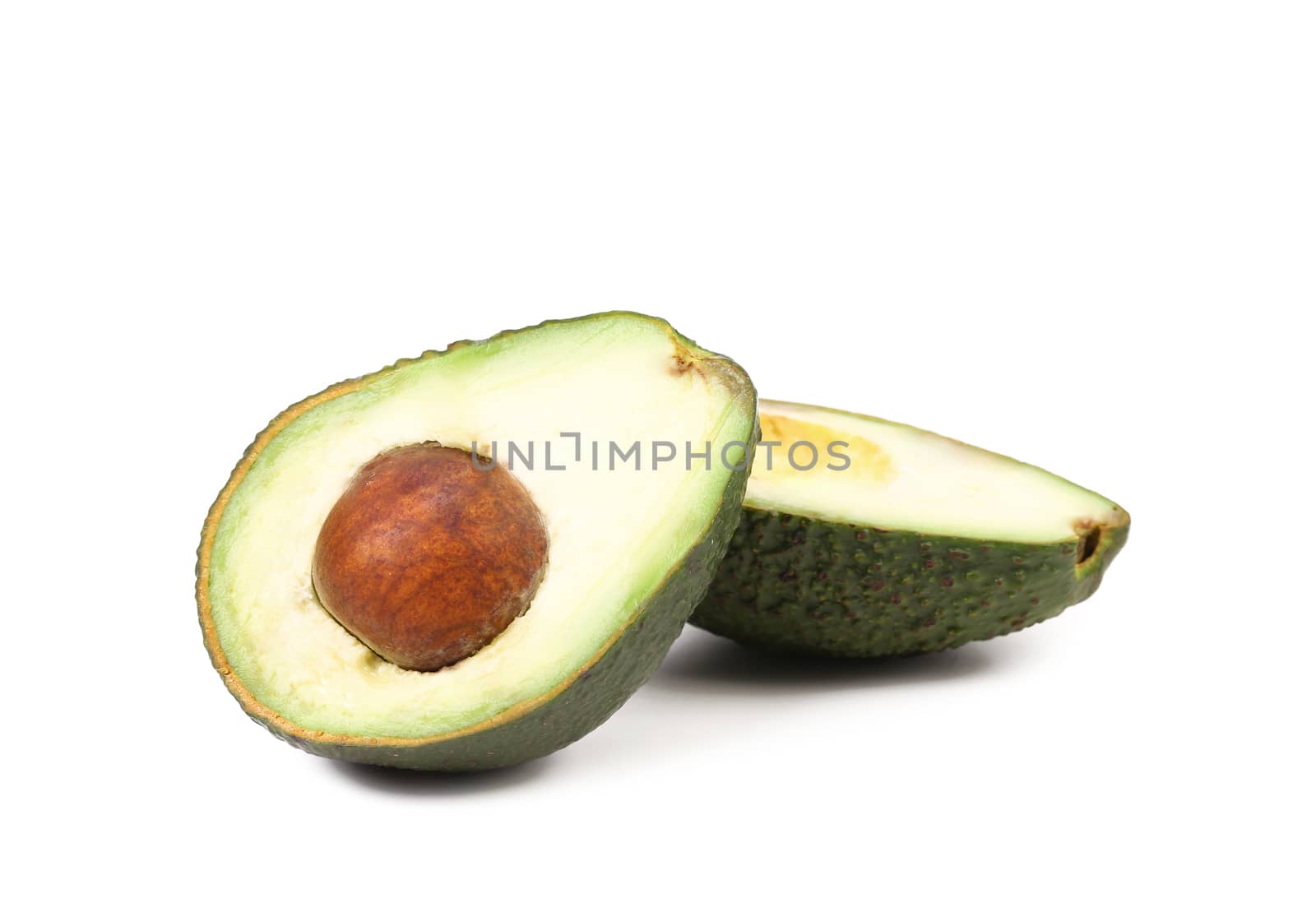 Splitted avocado. Isolated on a white background.