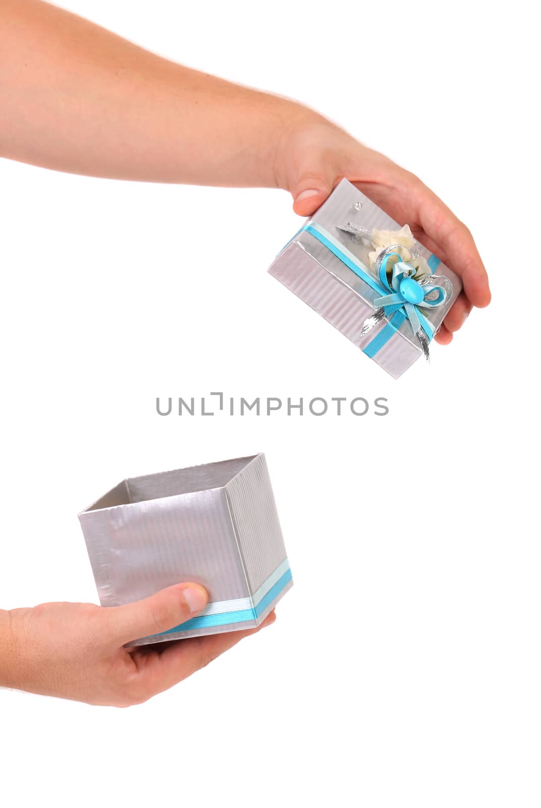 Opened silver gift box with blue ribbon. White background.
