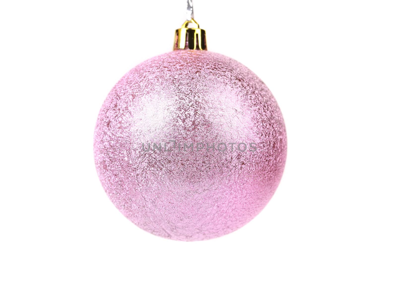 Pink dull christmas ball on a white background