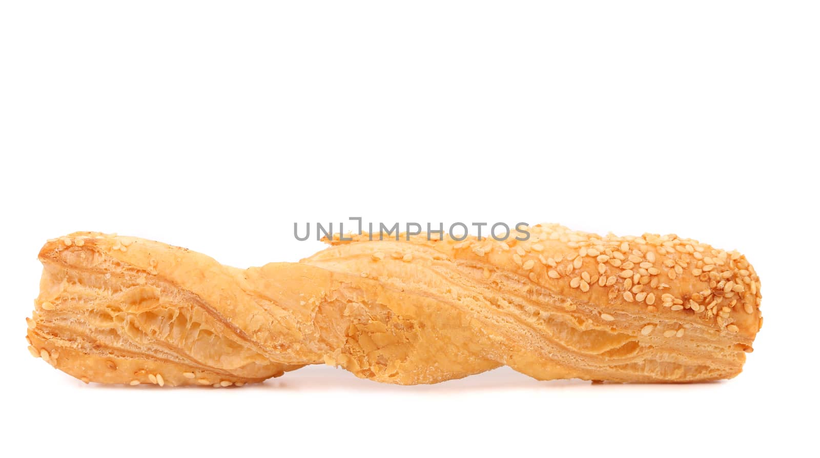 Just baked crunchy puff pastry with sesame. White background.