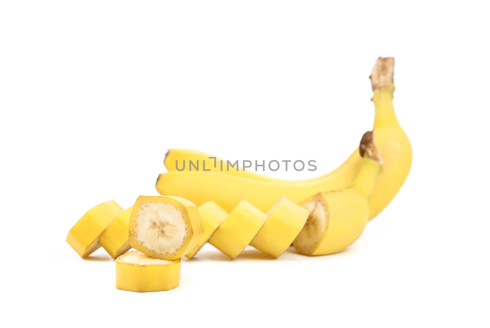 Bananas and slices isolated on a white background