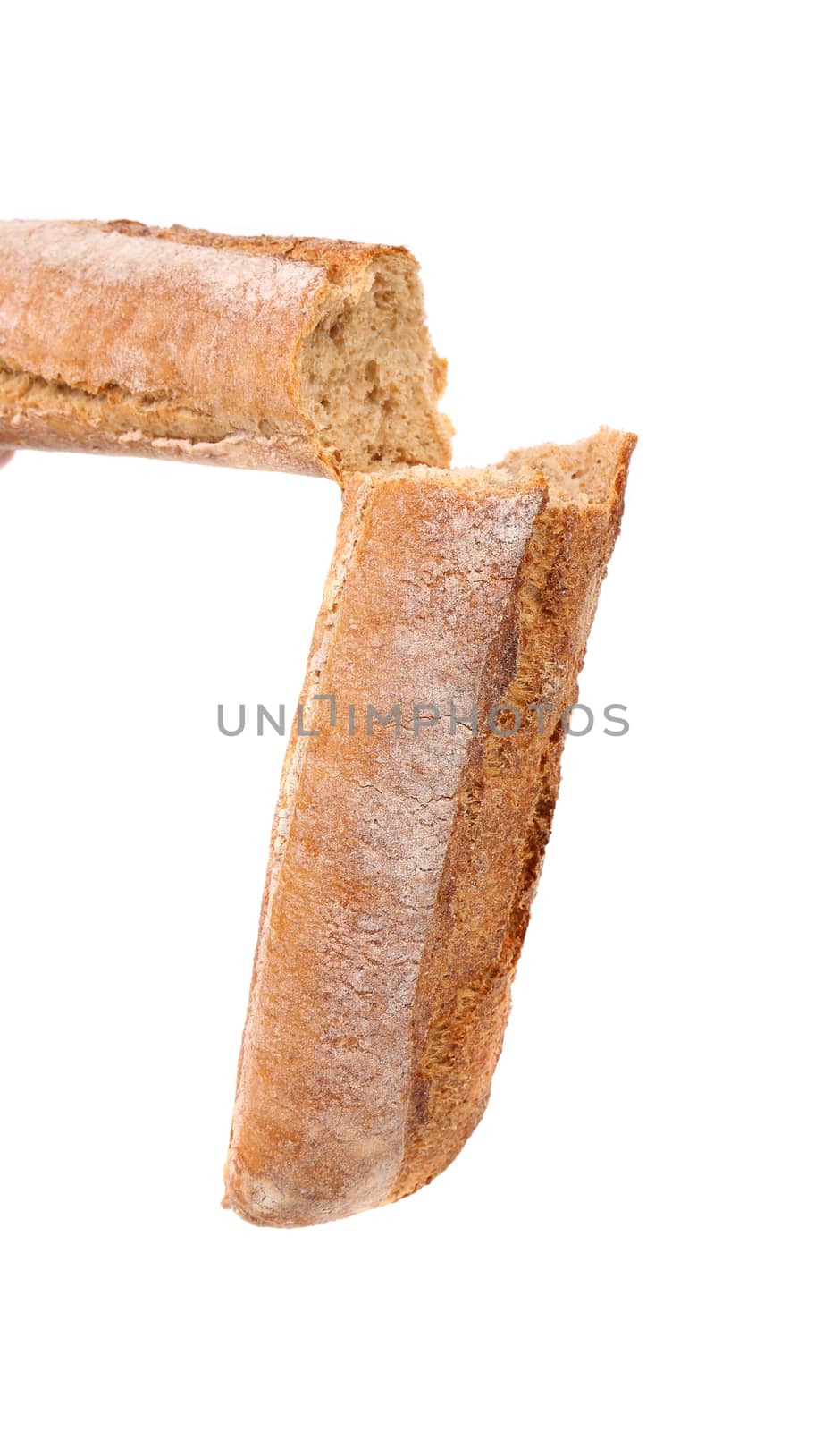 Broken long loaf isolated on white background