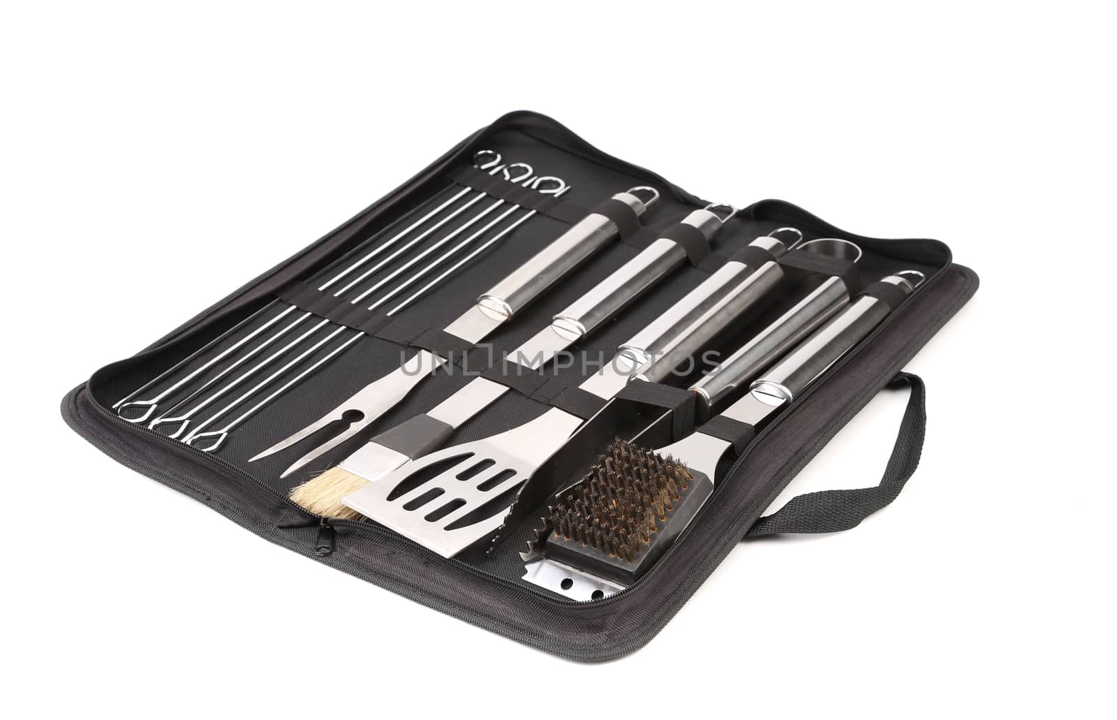 Set of tools for bbq in black bag. White background.
