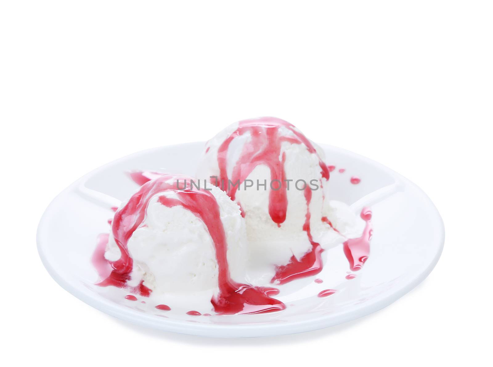 White ice cream and red syrop on a plate. White background.