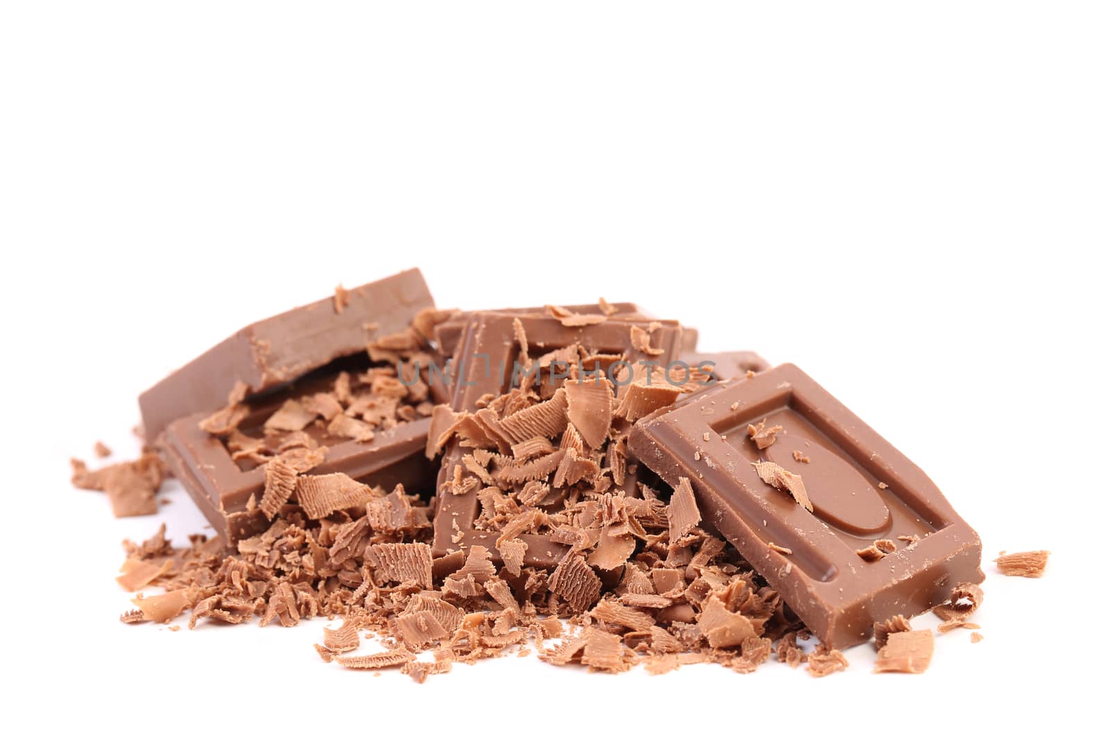 Chocolate bars and shaving. Isolated on a white background.