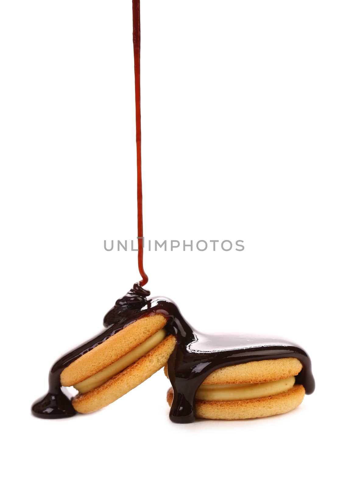 Stream chocolate and biscuit sandwich.  White background.