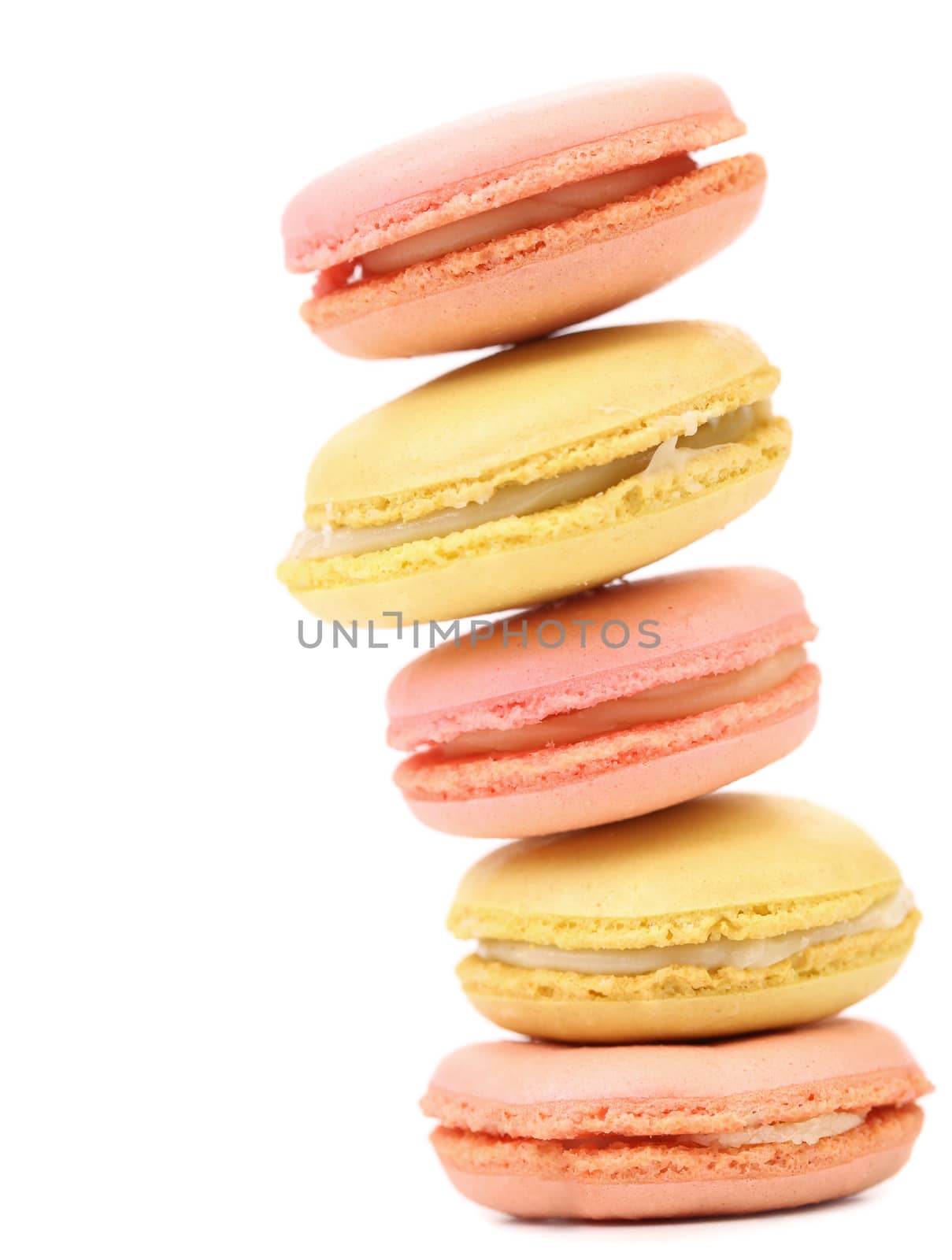 Stack of macaron cakes. Isolated on a white background.
