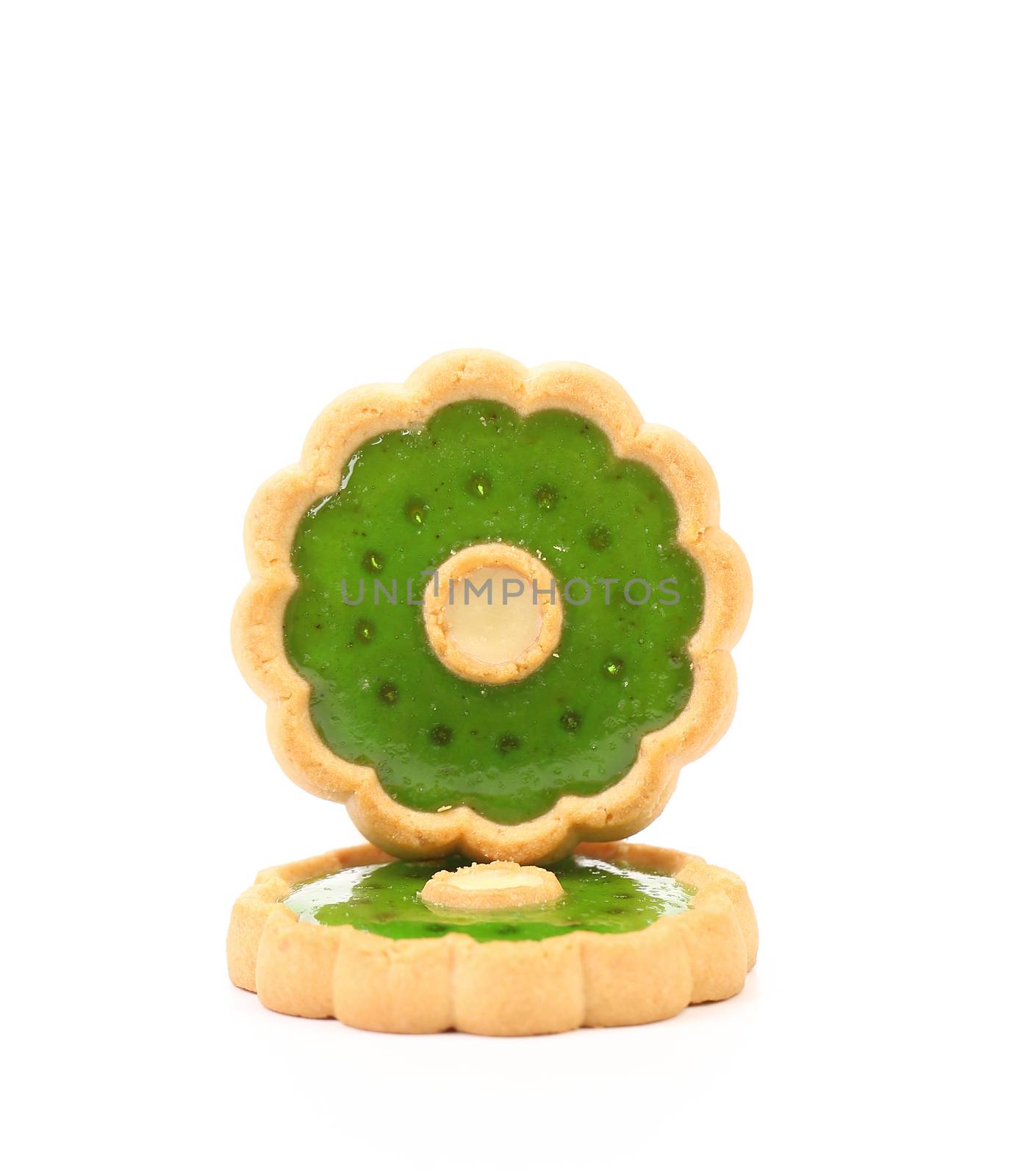 Biscuits with kiwi jam. Isolated on a white background.