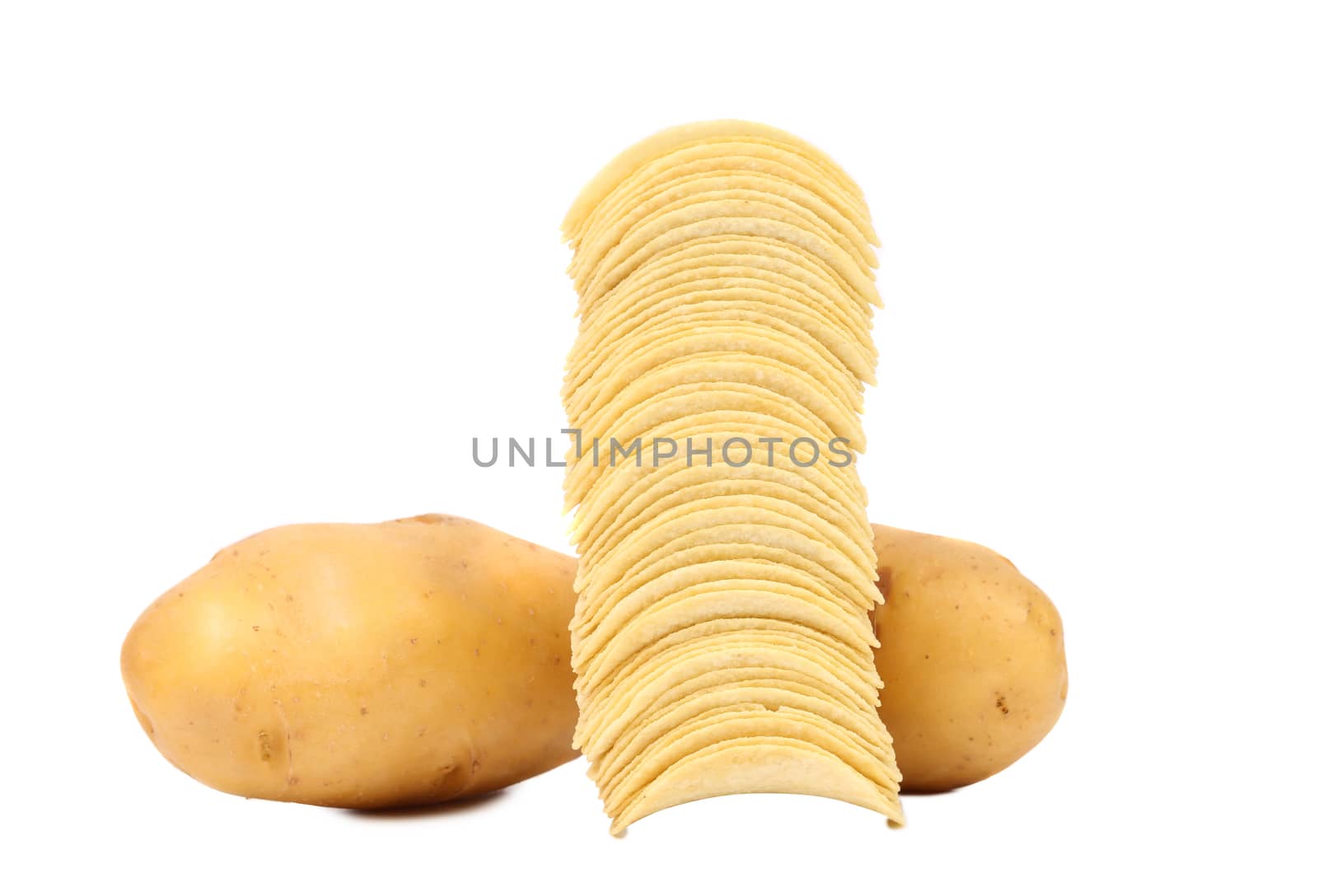 Tubers of potato and stack chips. White background.