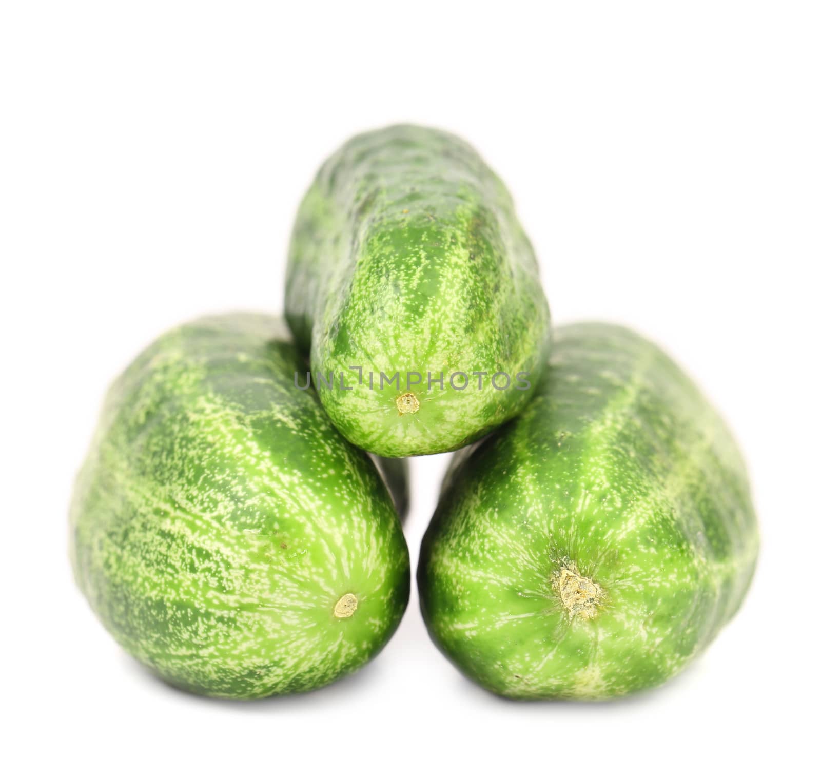 Three tails of cucumber. Isolated on a white background.