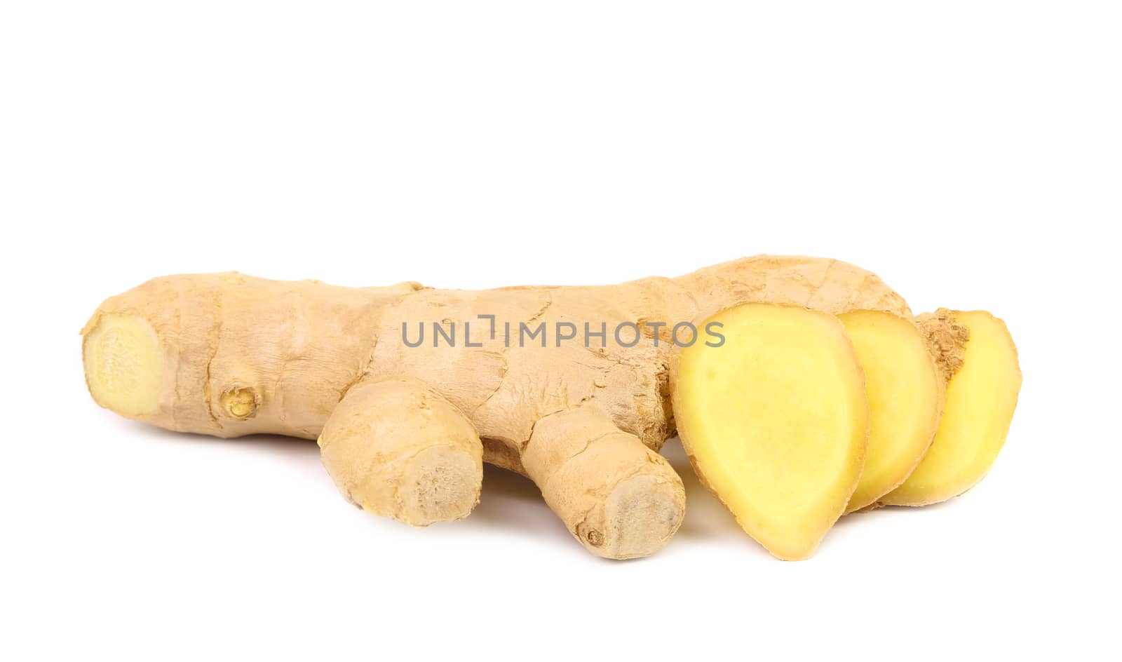 fresh ginger and slices on a white background