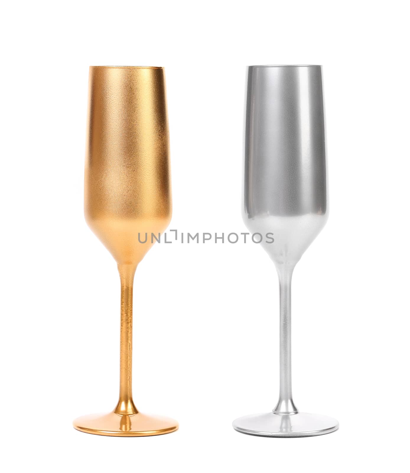 Golden and silver champagne glasses. White background.