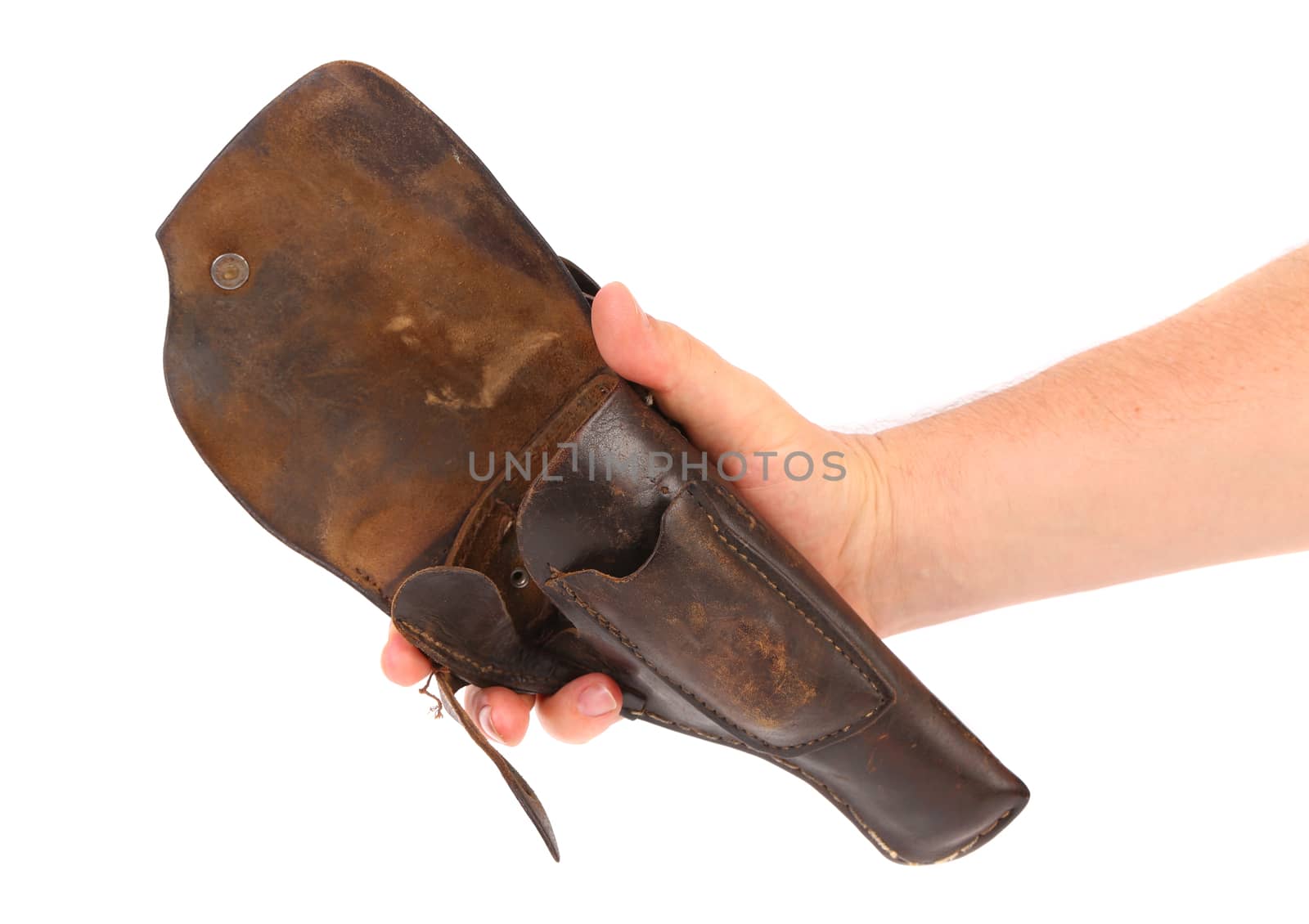 Hand holds old brown holster isolated on white background.