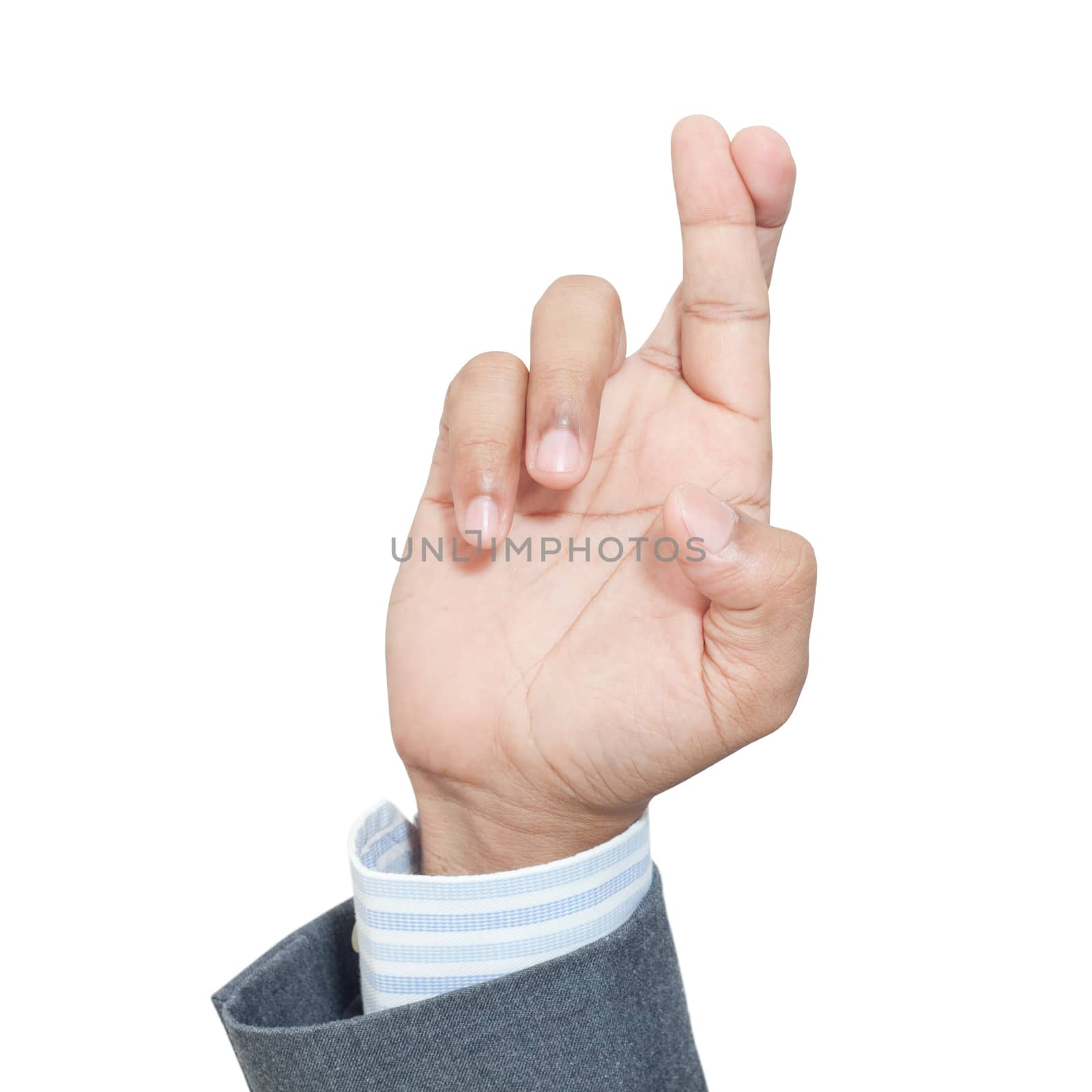 Business man's finger crossed hand sign isolated on white by foto76